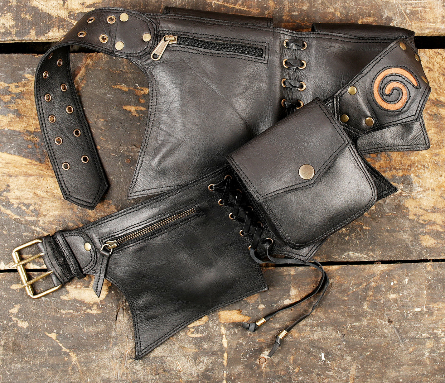 Pirate cosplay black leather pocket belt with multiple pouches and a rustic weathered look.