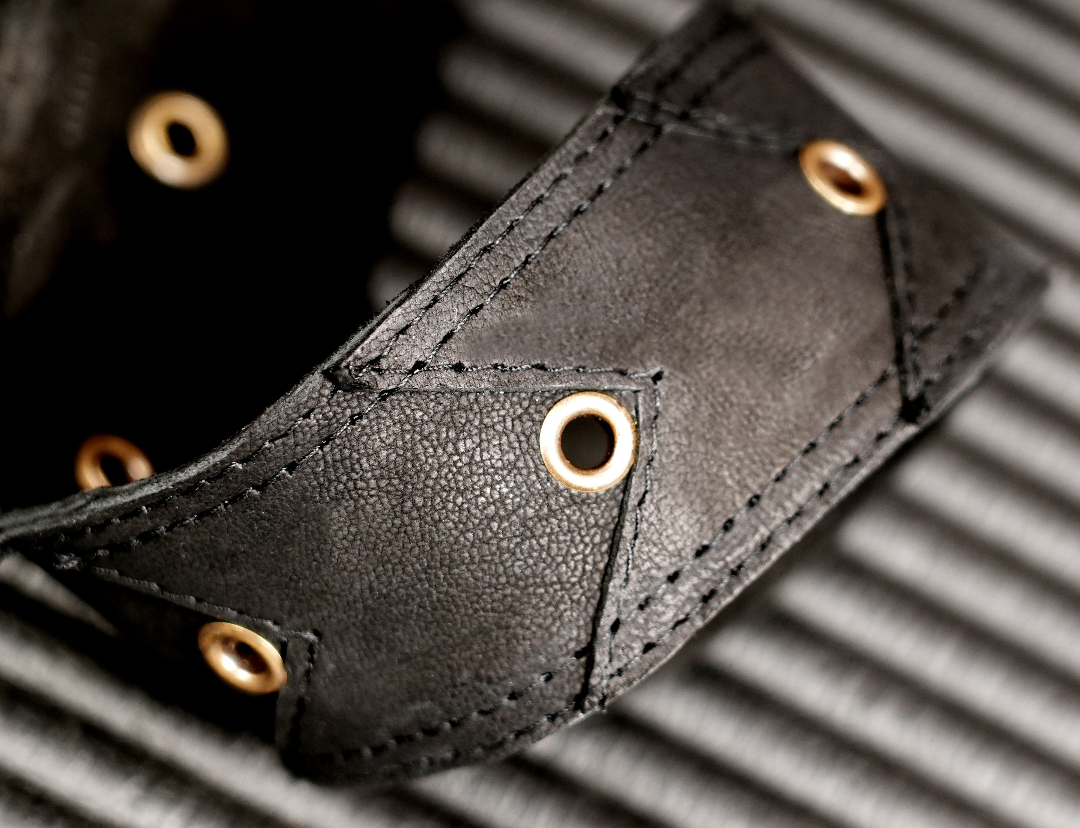 Adjustable black leather waist and thigh pouch