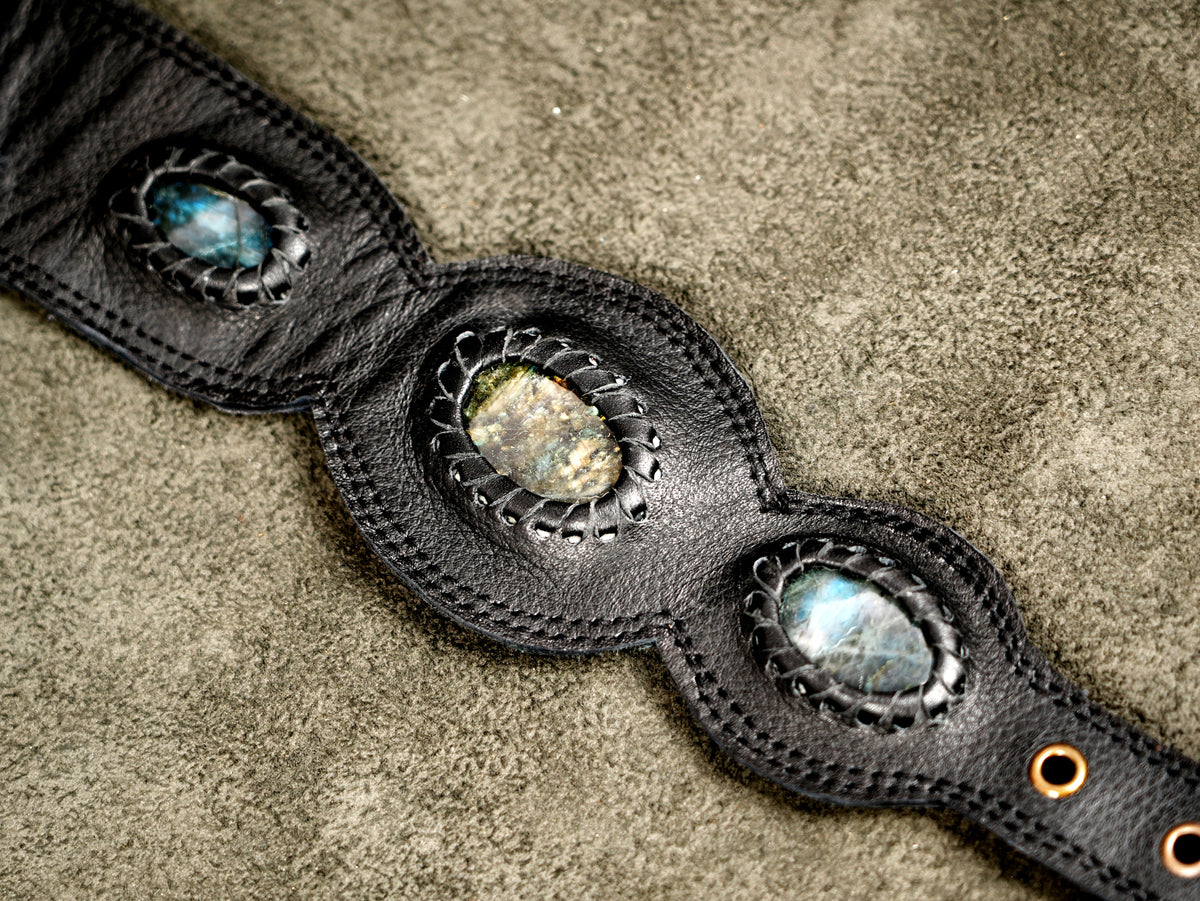 Adjustable leather body holster with mandala tooling detail