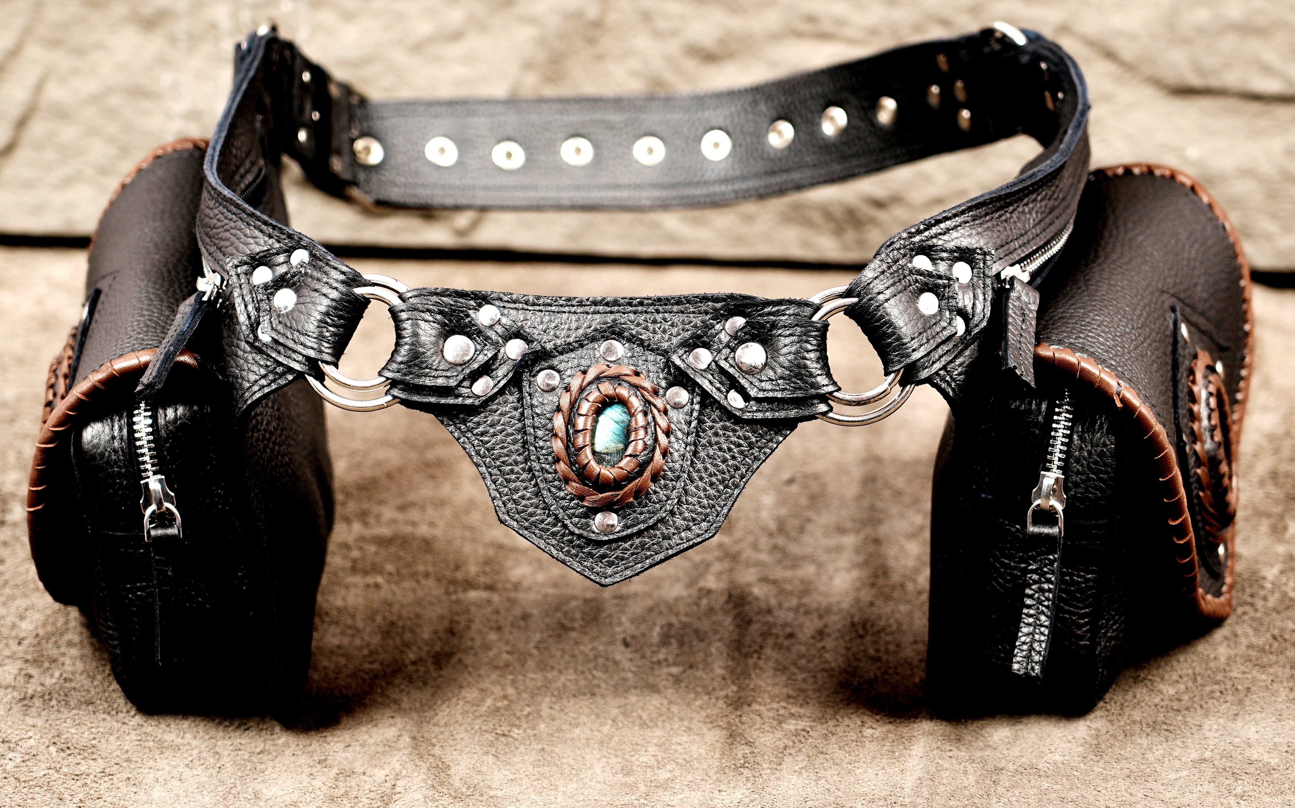 Adjustable leather costume belt with pointed pocket flaps