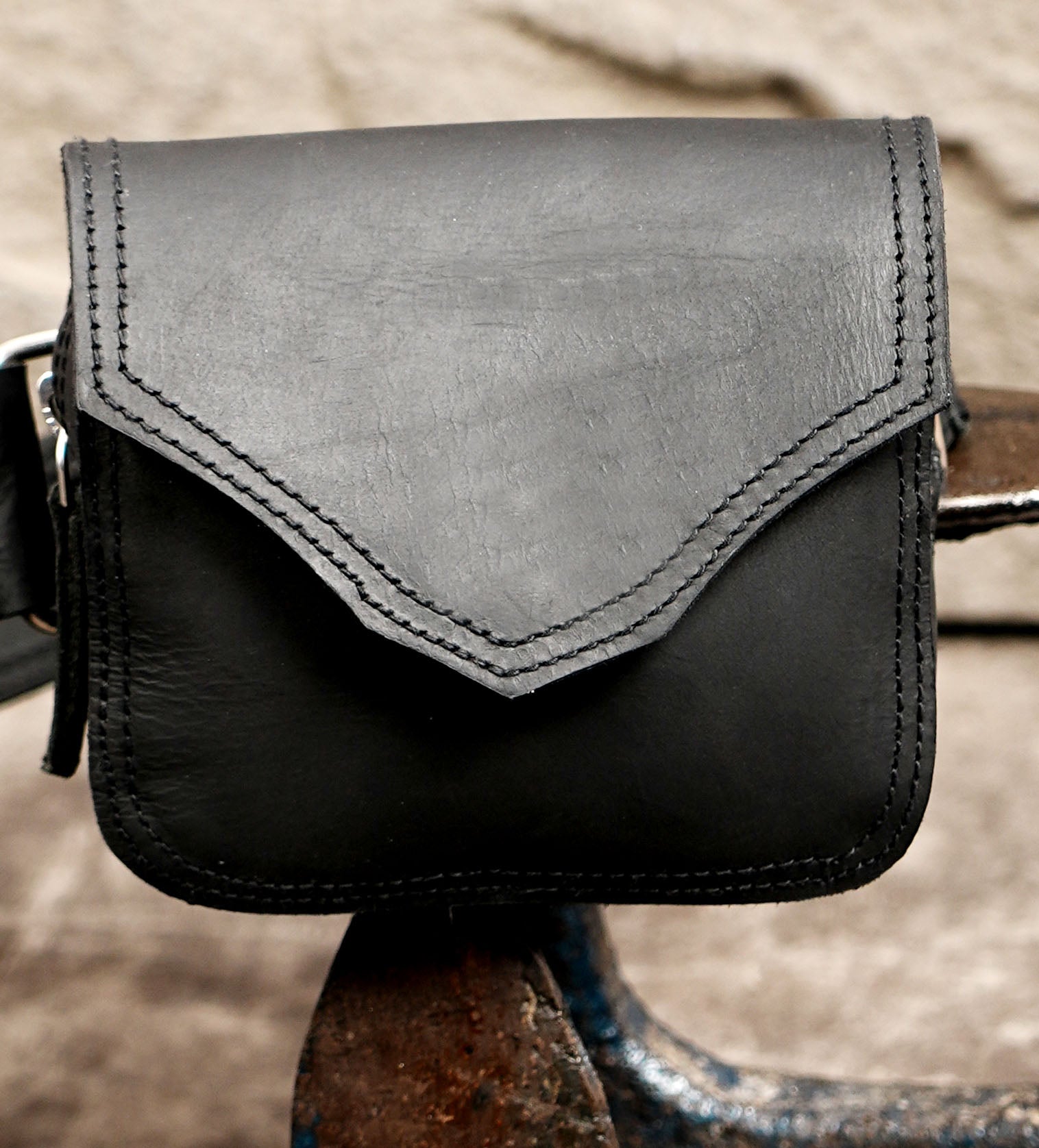 Adjustable leather hip bag with attached side pouch