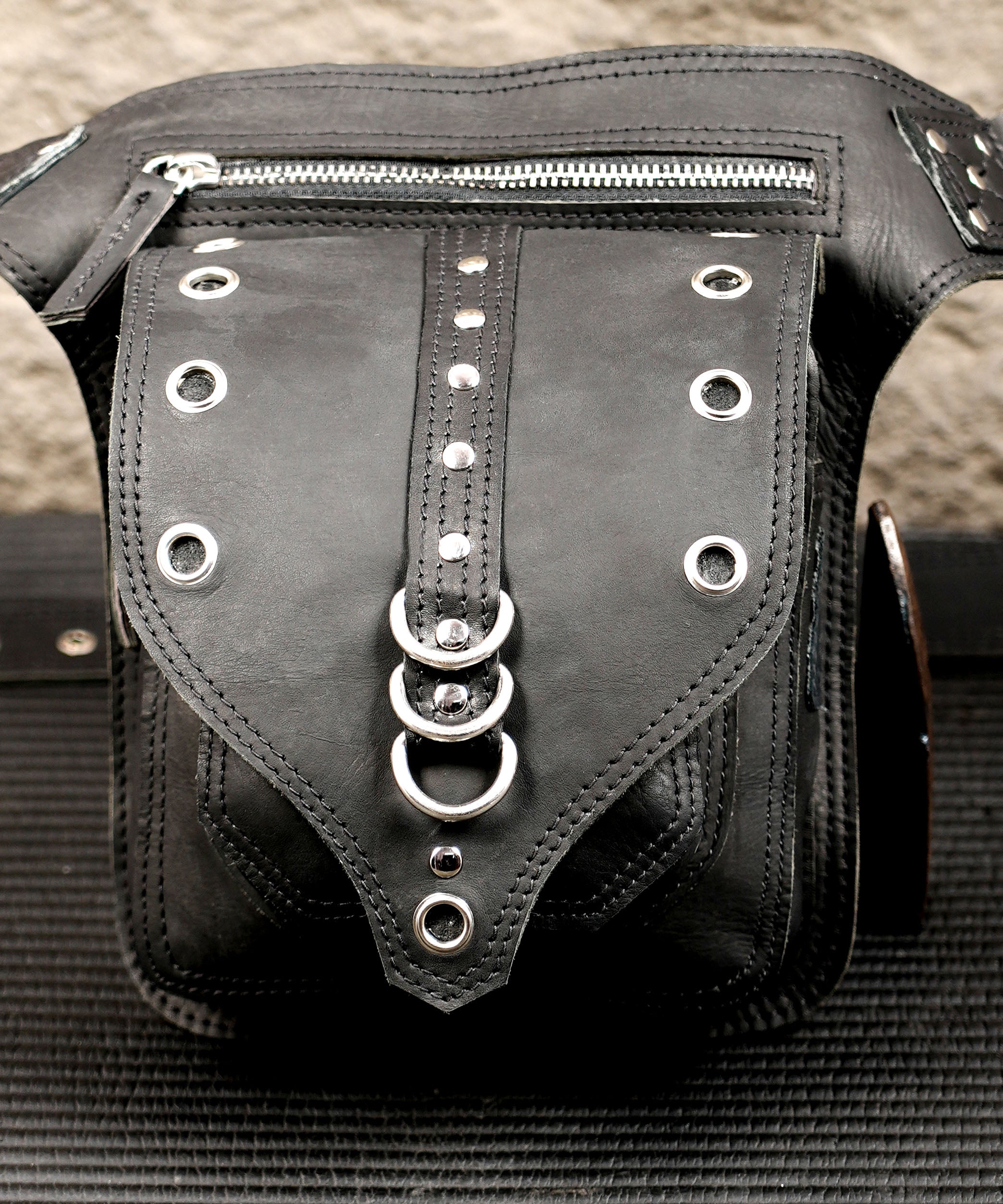 Adjustable leather hip pouch with antique brass fittings