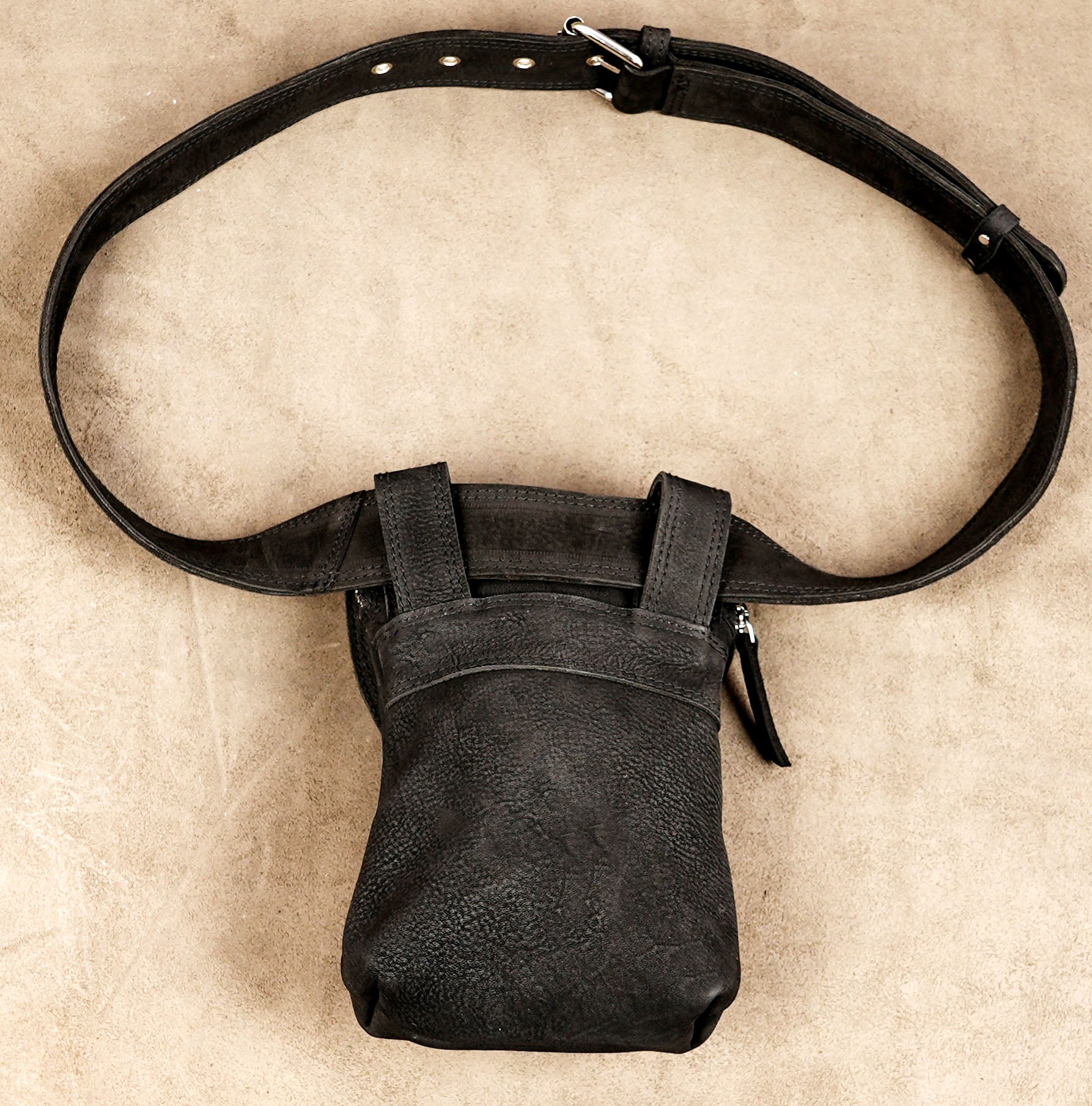 Adjustable leather waist strap with rectangular pouch