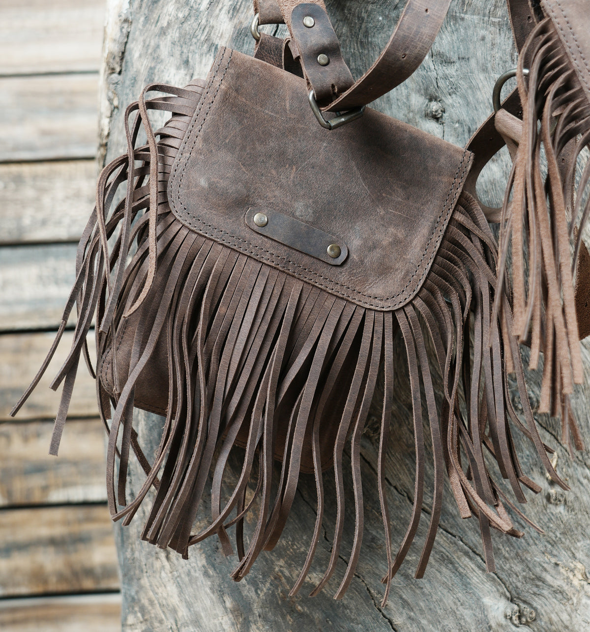 Brown Leather Chest Harness Bag with Fringe Pockets and Studded Yoke