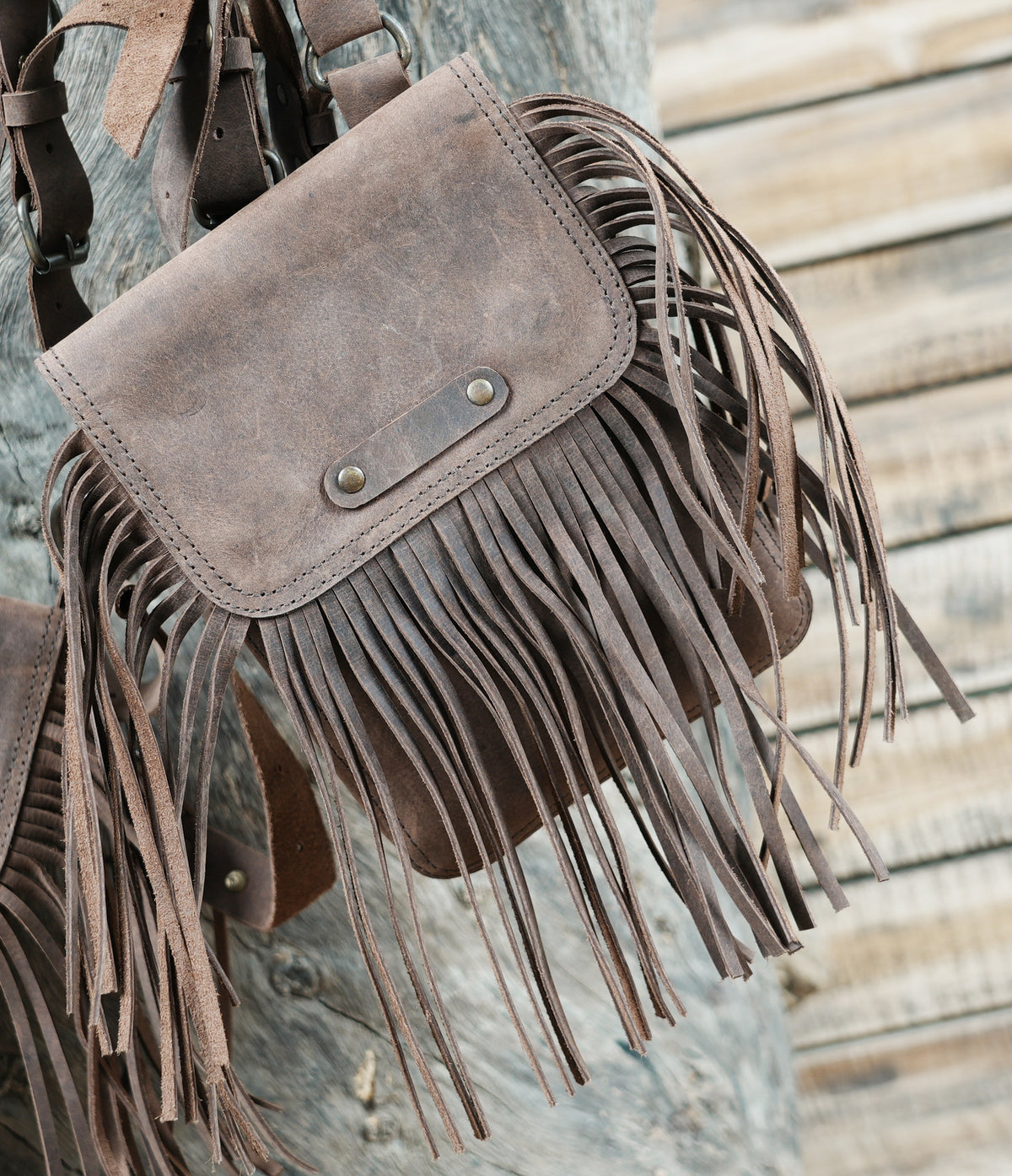 Brown Leather Chest Harness Bag with Fringe Pockets and Studded Yoke