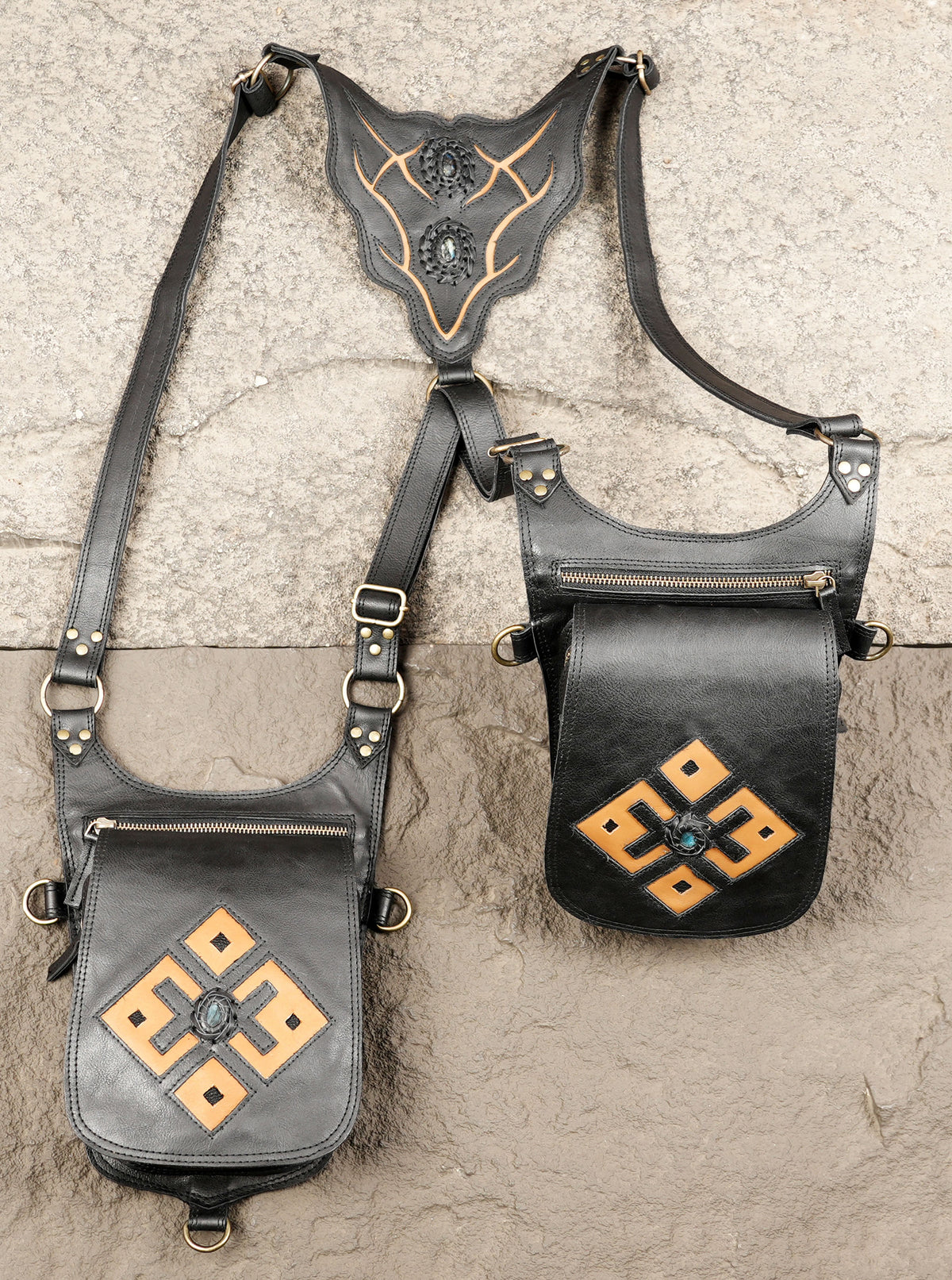 Black leather utility harness bag with adjustable chest straps
