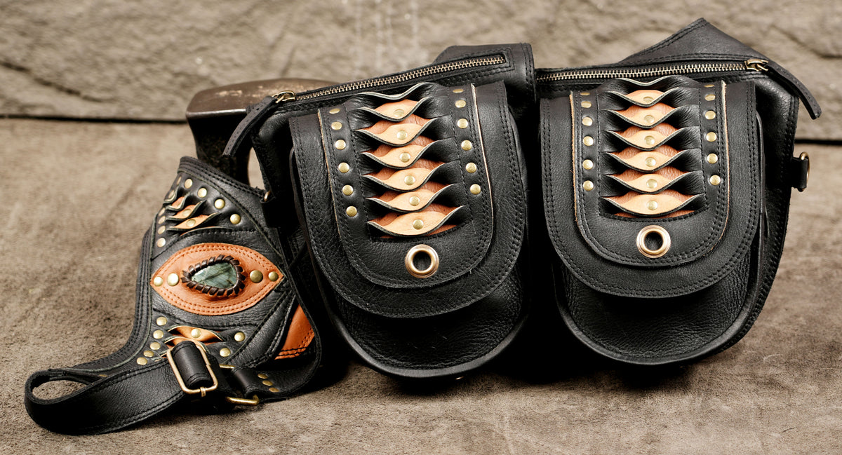 Steampunk leather shoulder harness bag with two utility pockets and decorative stone centerpiece