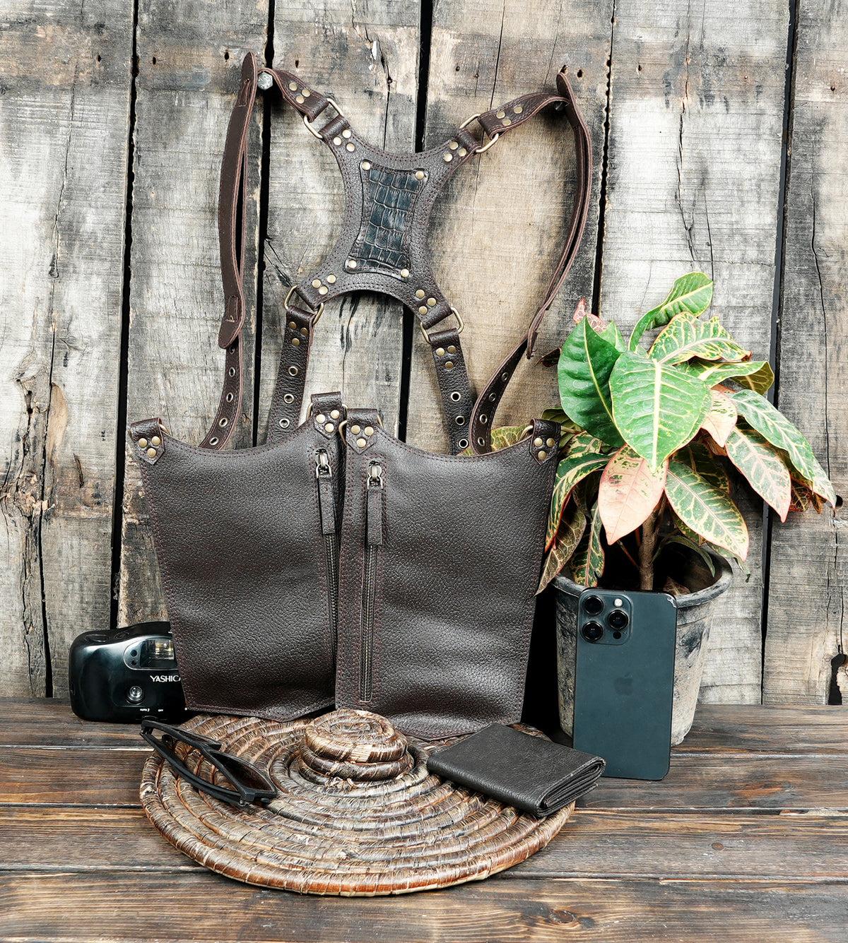 Steampunk brown leather double thigh harness with metal buckles and studded details.