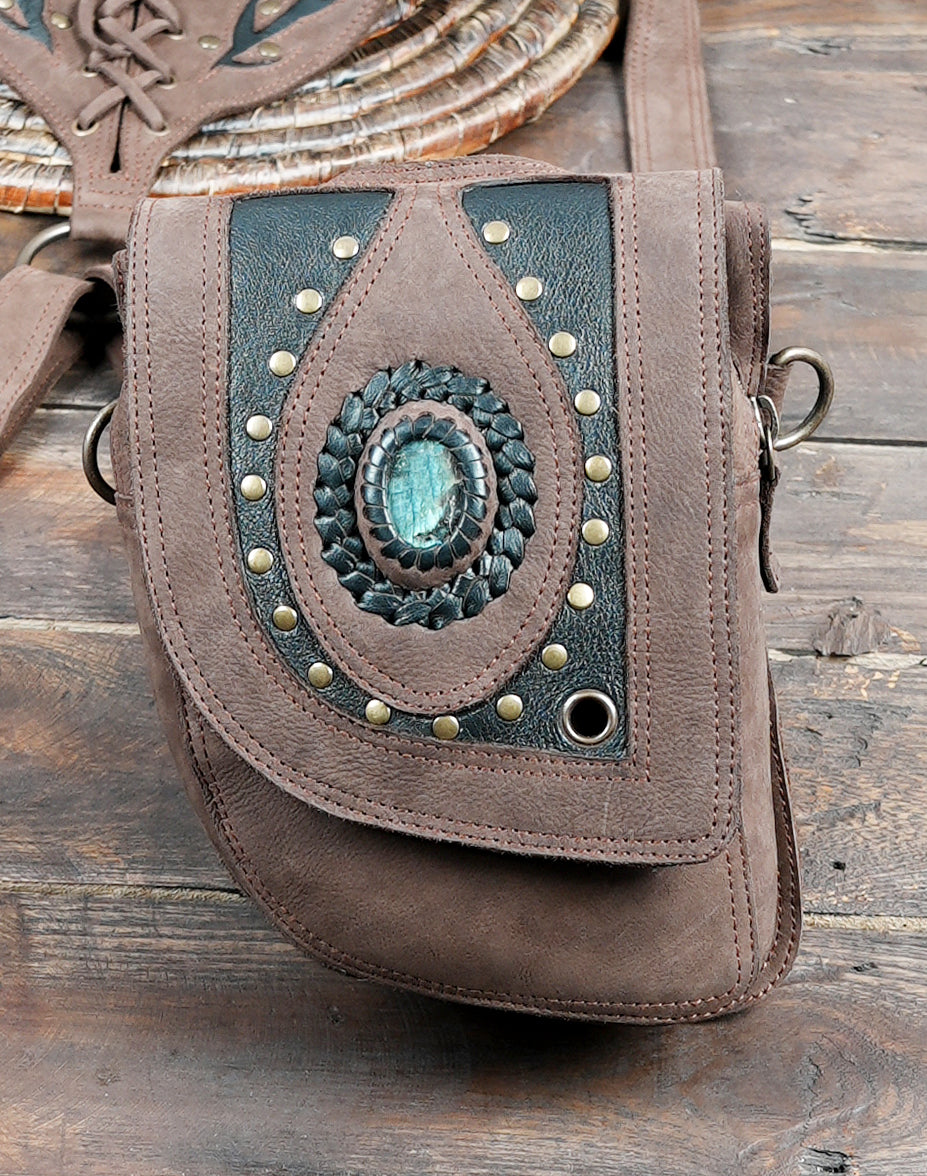 Brown leather double shoulder harness bag with utility pockets