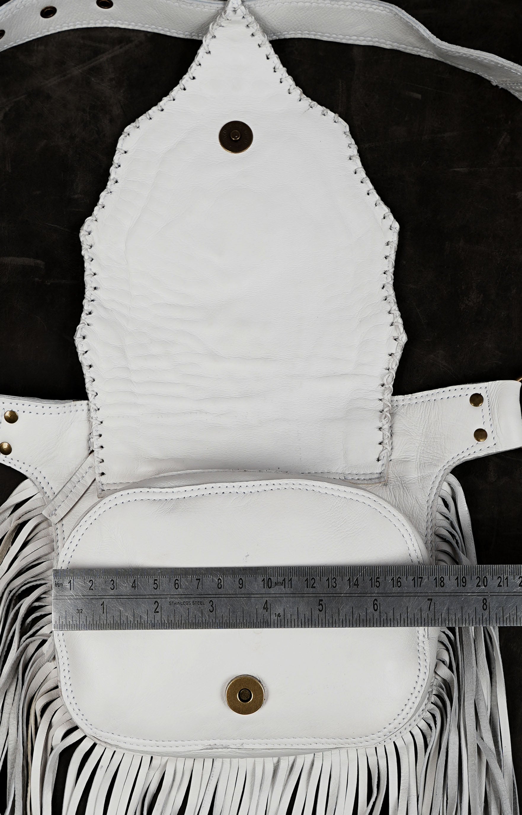Artisan-made white leather waist bag with crystal centerpiece
