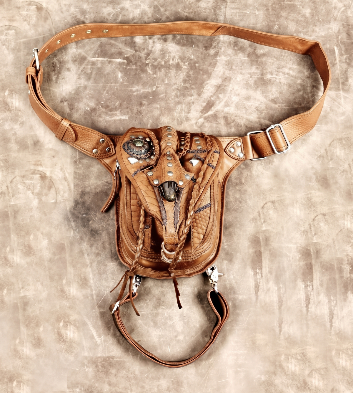 Decorative black leather belt harness with hanging strap and silver-tone hardware