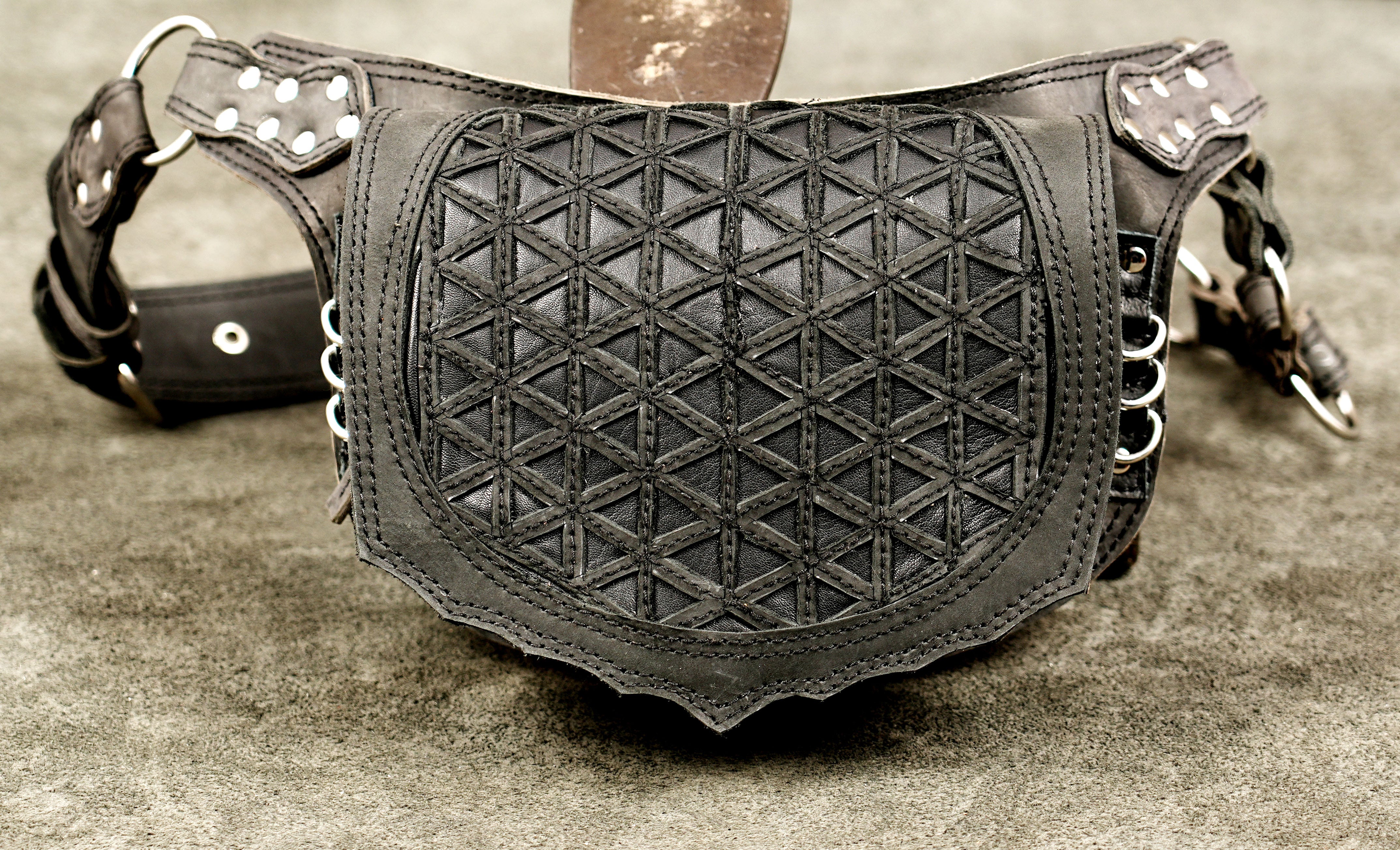 Artisan crafted waist pouch, chain hardware detail shot