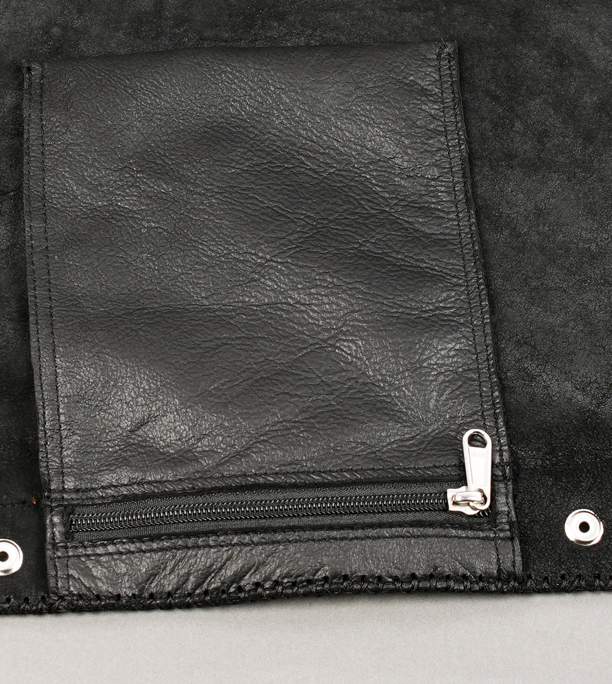 Artisan leather wrap skirt with silver studs and braided waistband
