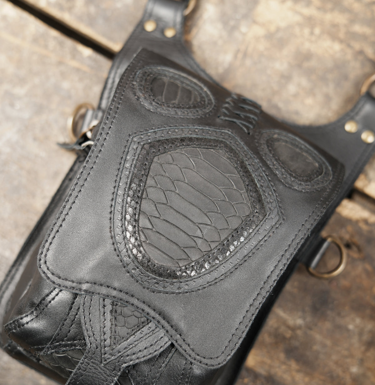 Leather chest harness bag with two compact pouches for alternative fashion outfits