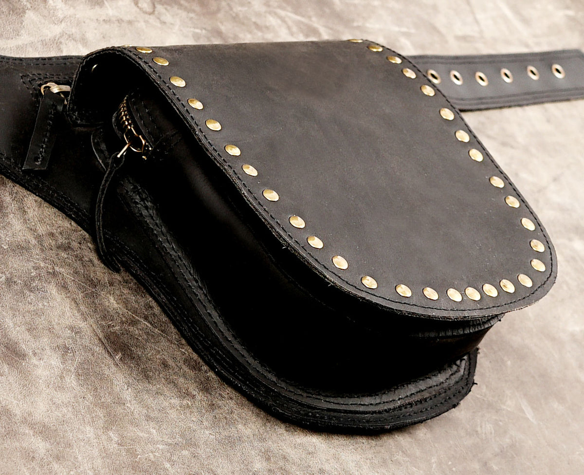 Asymmetric leather belt bag with brass studs and buckle