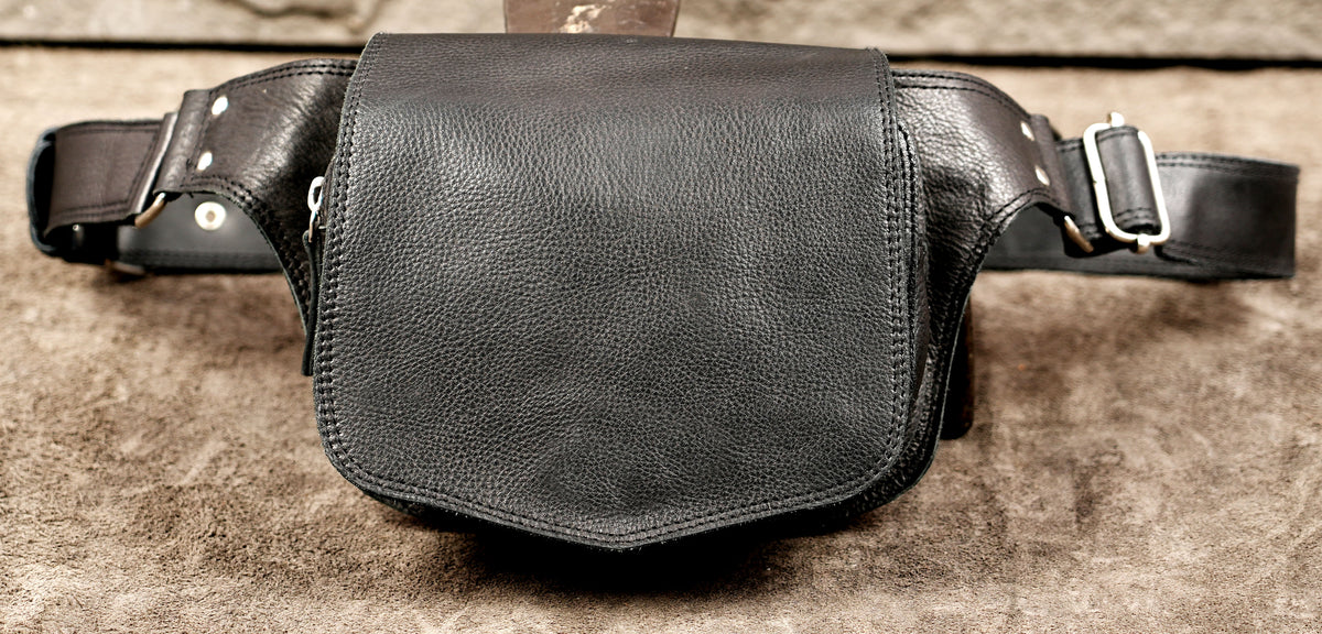 Black leather crossbody pouch with zip pocket closure