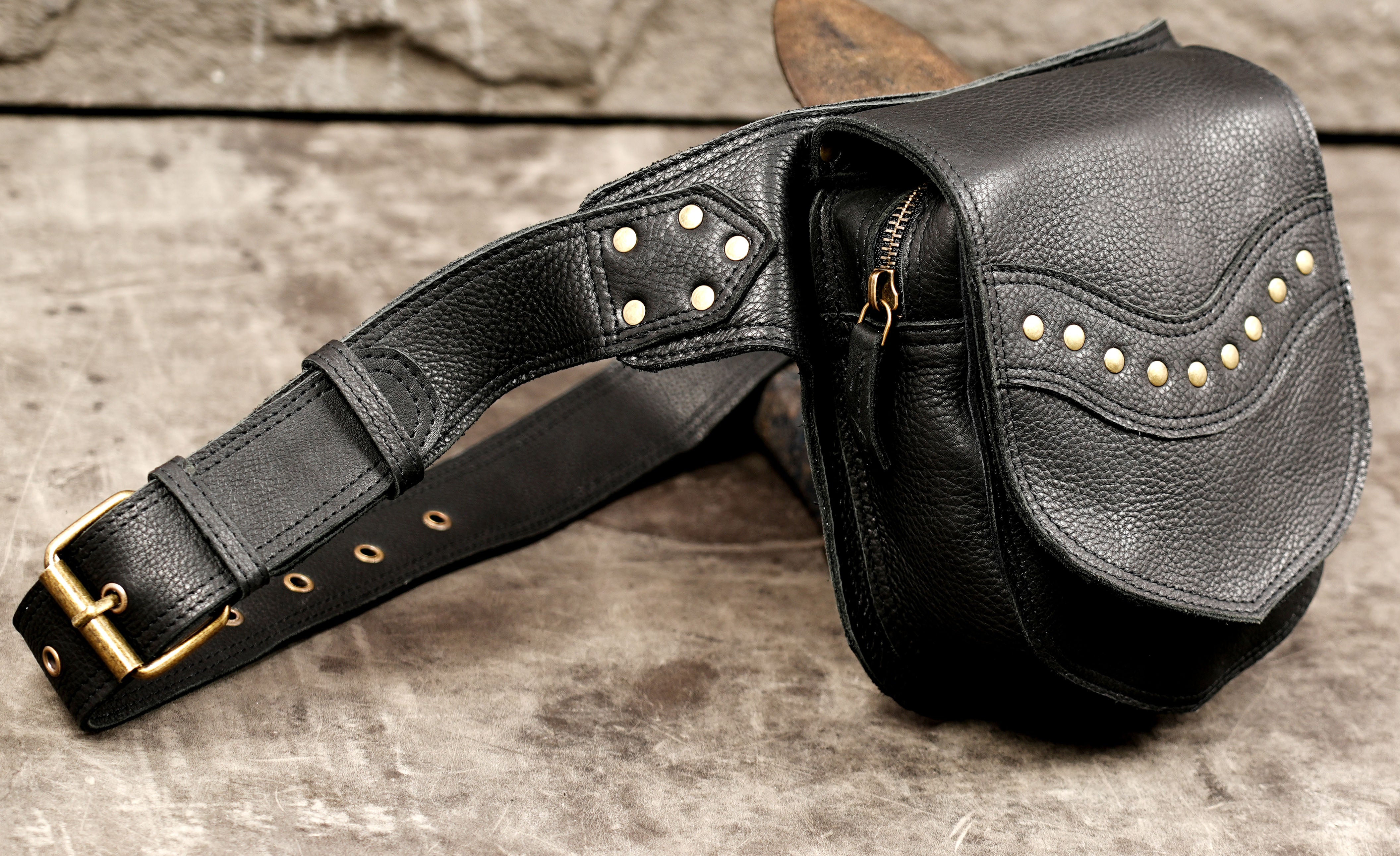 Black leather festival bag with layered front storage pocket