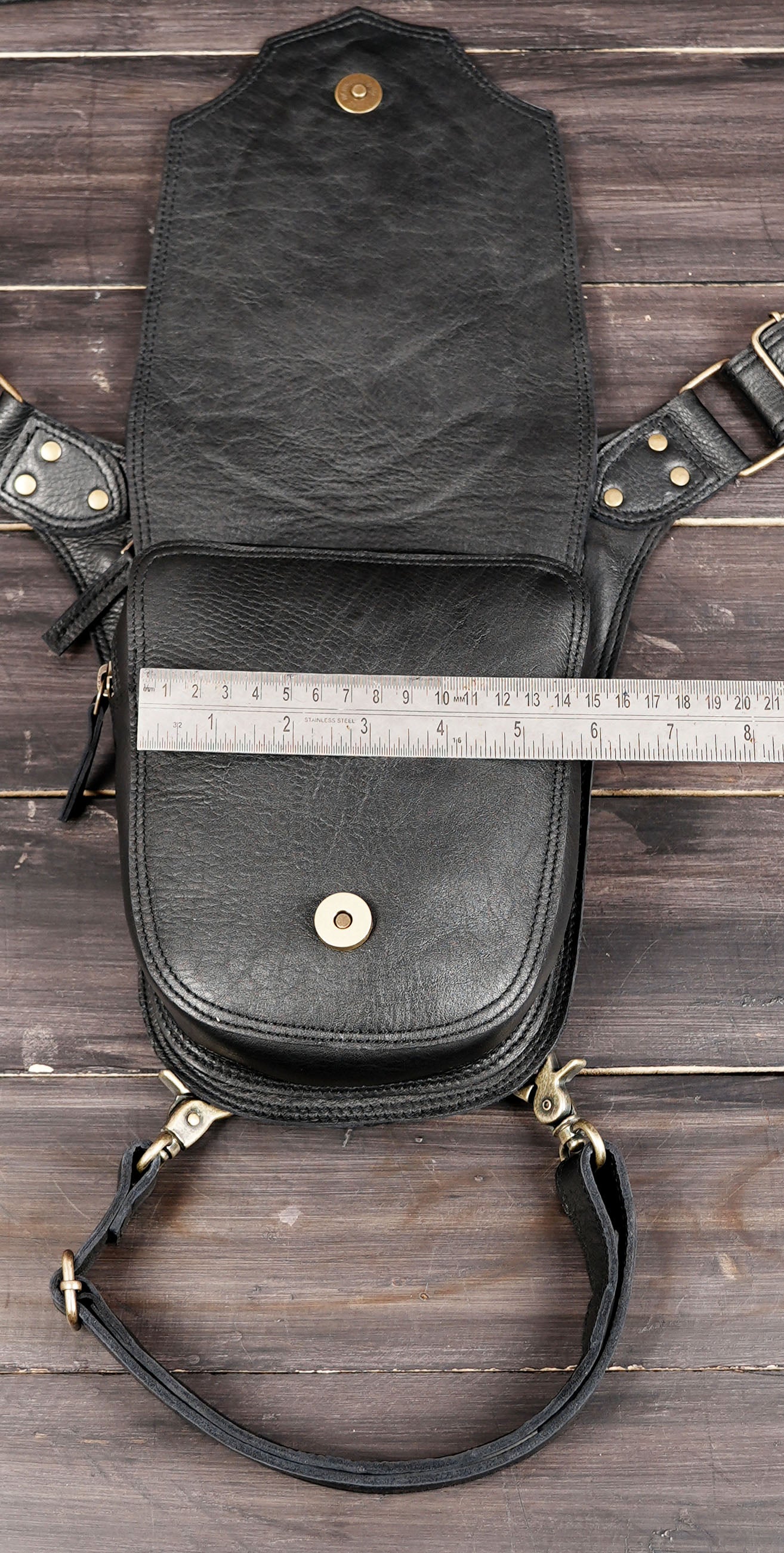 Black leather leg bag for festivals and travel