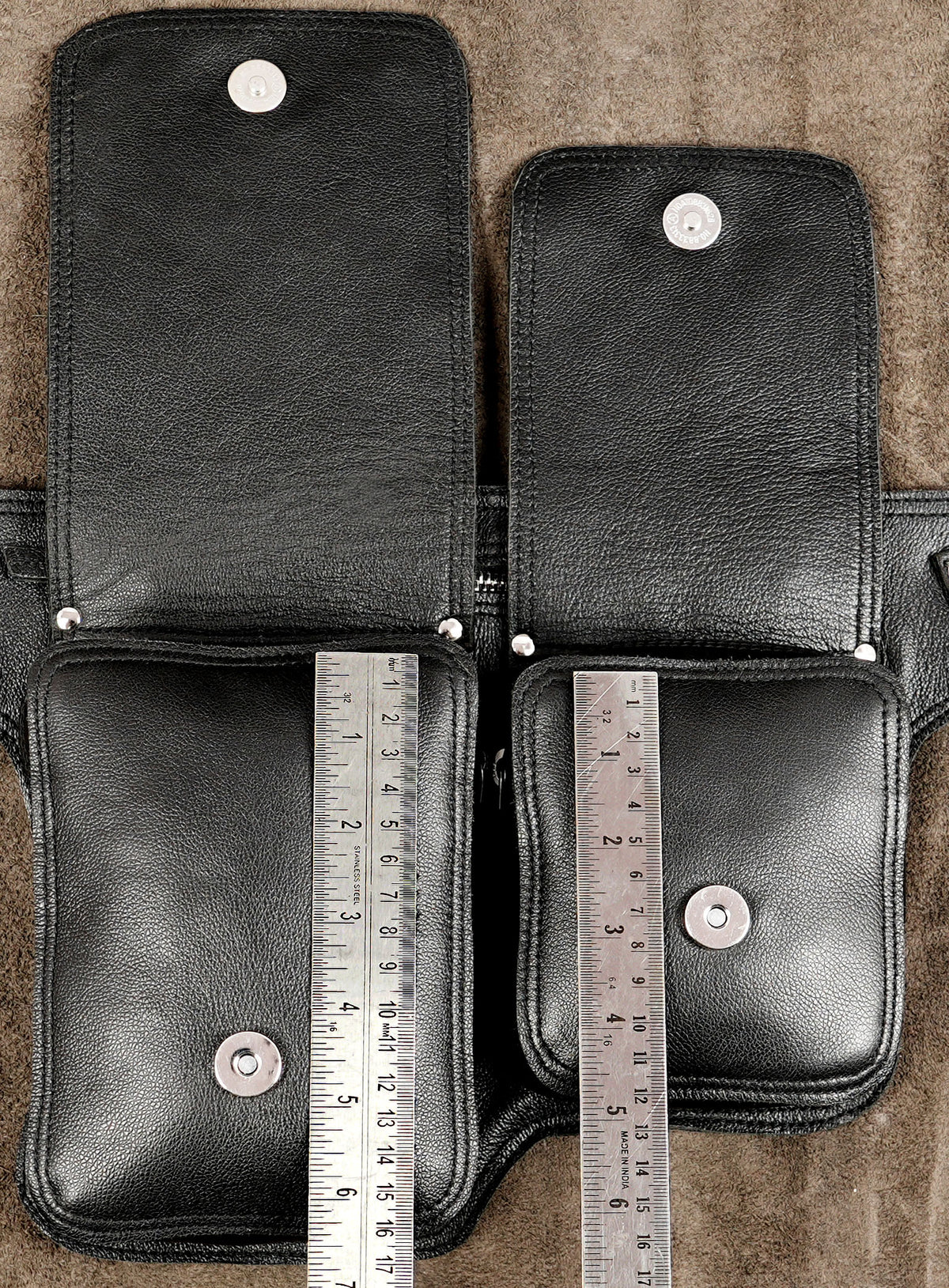 Black leather travel bag with two front compartments