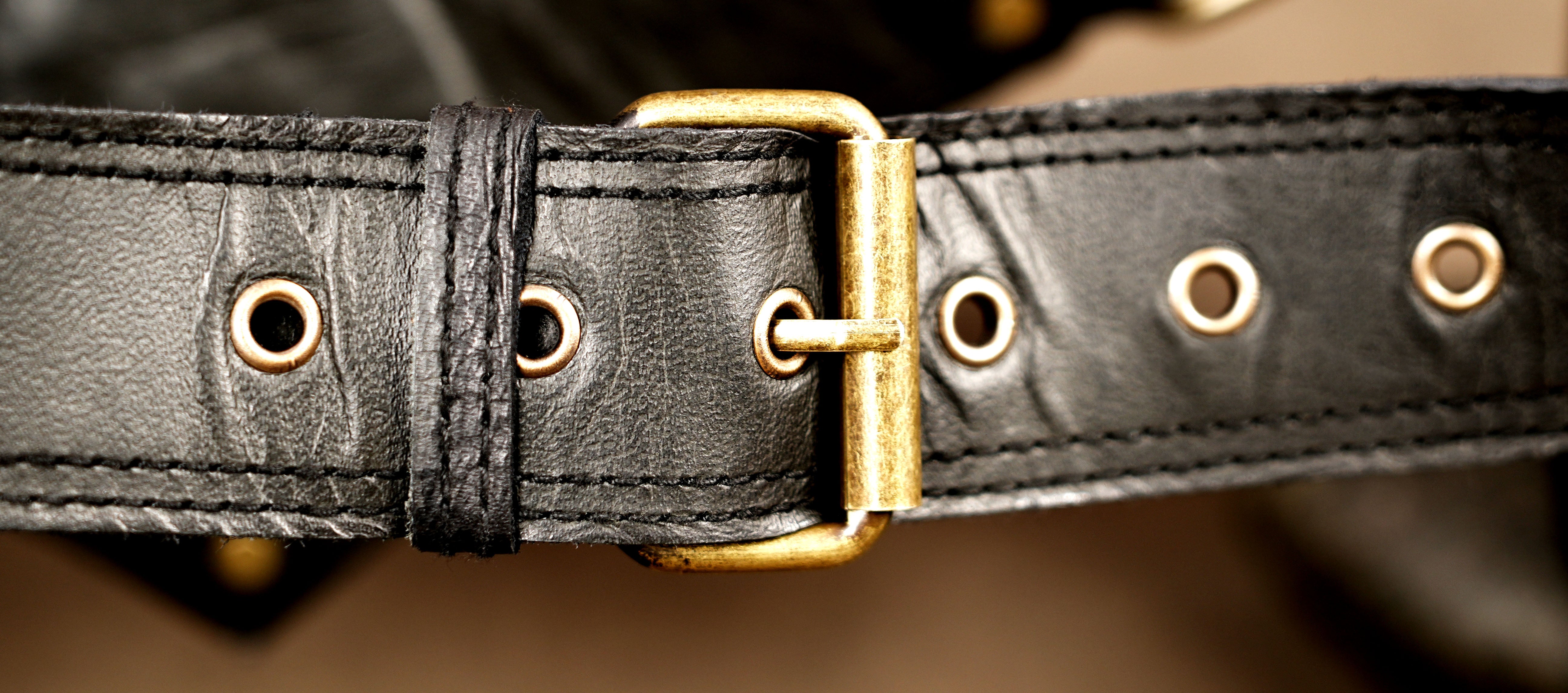 Black leather utility belt with detachable side pouches