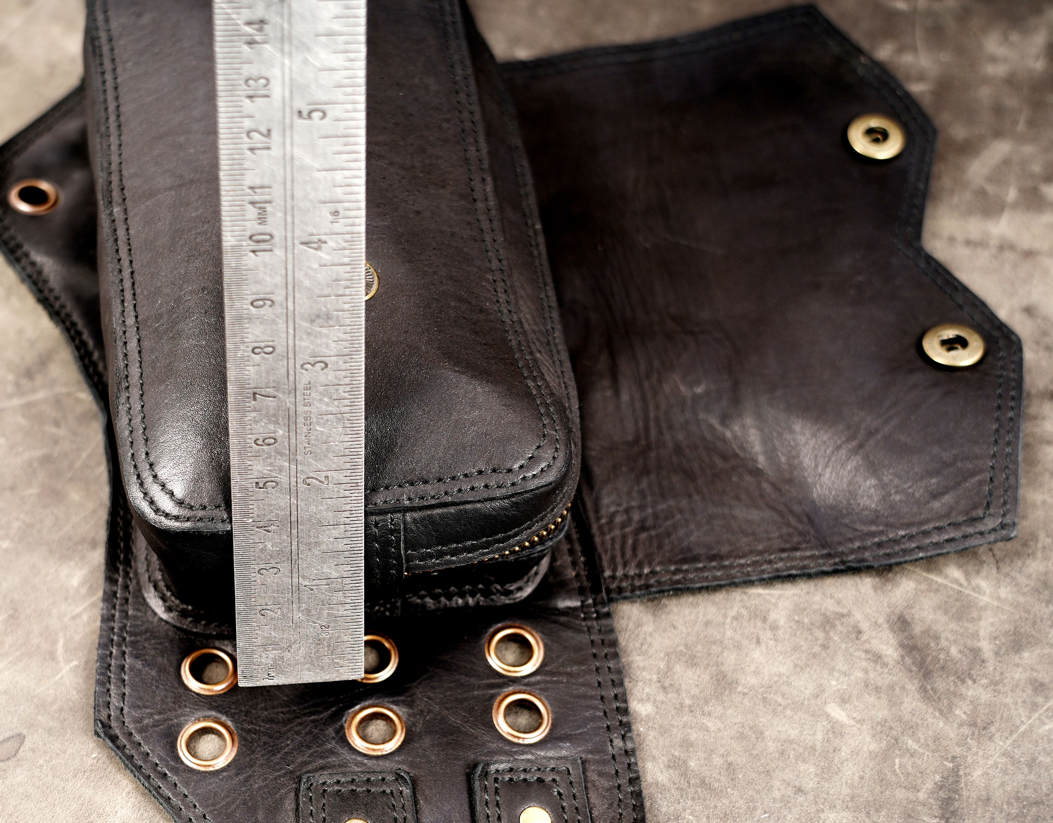 Black leather utility pouch belt with metal D-rings