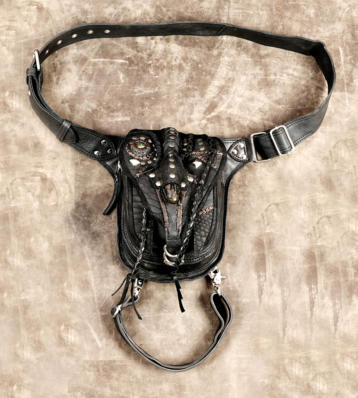 Heavy-duty black leather utility hip bag with adjustable waist strap