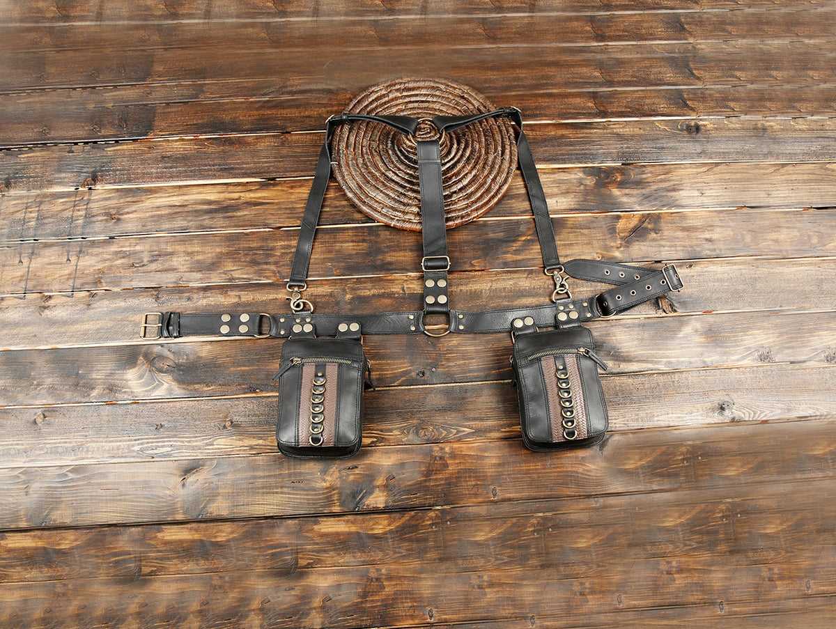 Black leather harness belt with double zipper utility pouches and metal hardware