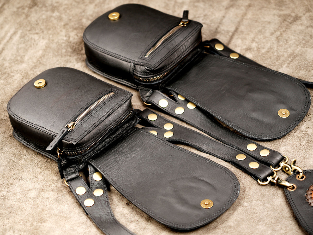 Black leather double holster bag for Burning Man and music festivalsBlack leather double holster bag for Burning Man and music festivals
