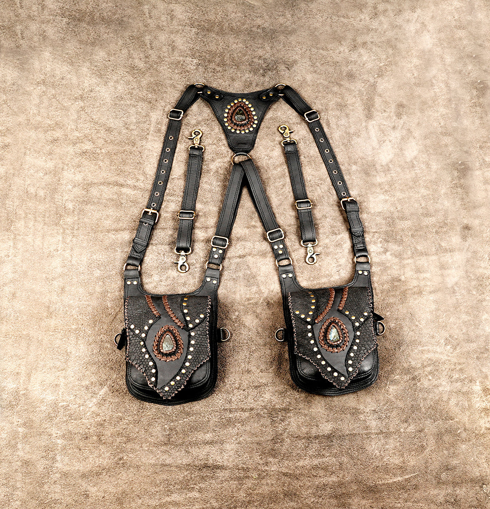 Black leather shoulder holster bag with dual utility pouches and gemstone detailing