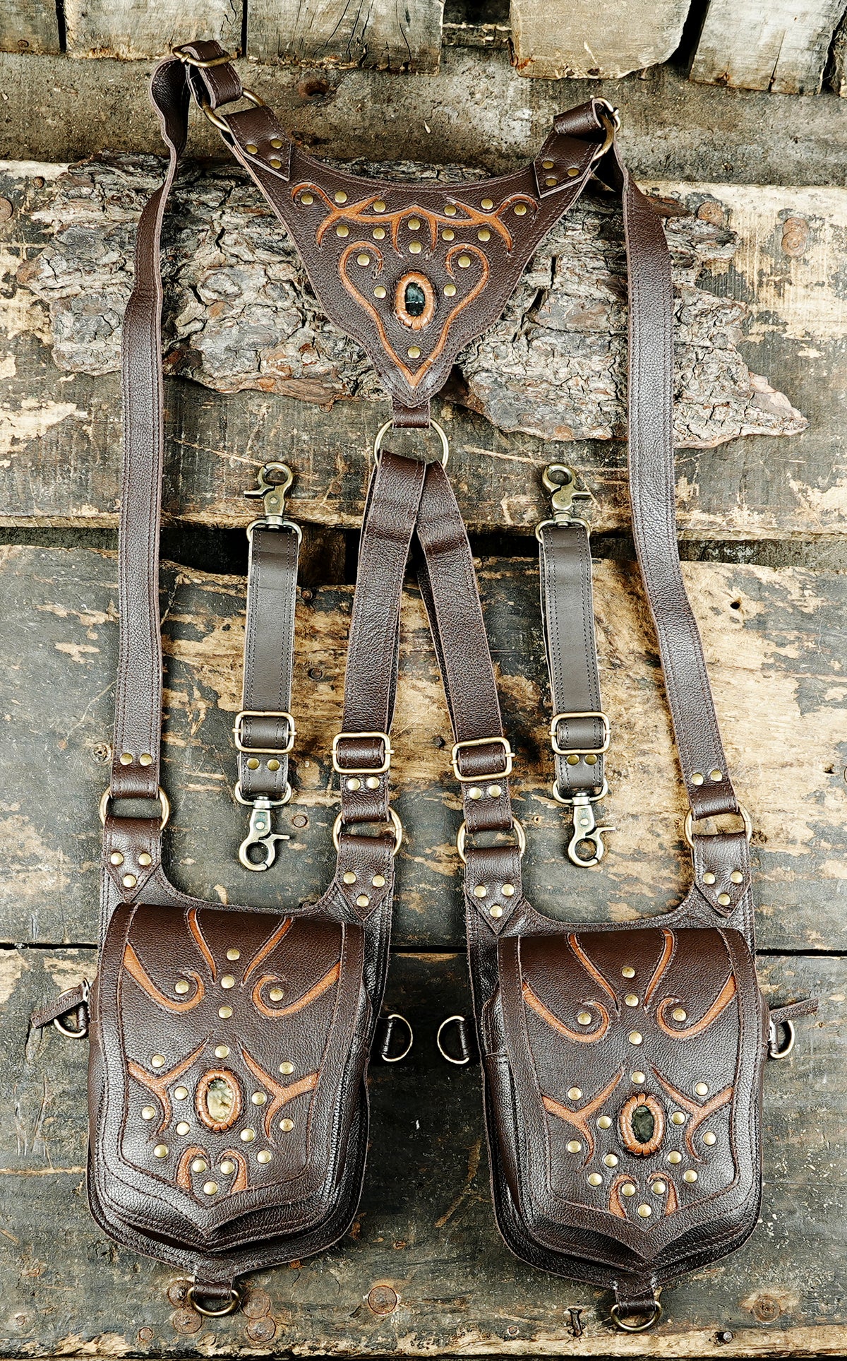 Black leather Burning Man harness bag with two pockets and adjustable shoulder straps