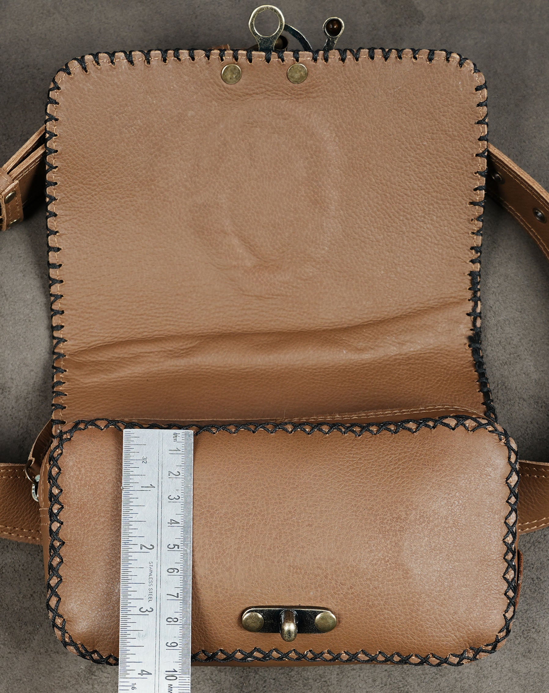 Bohemian brown leather waist bag with secure clasp