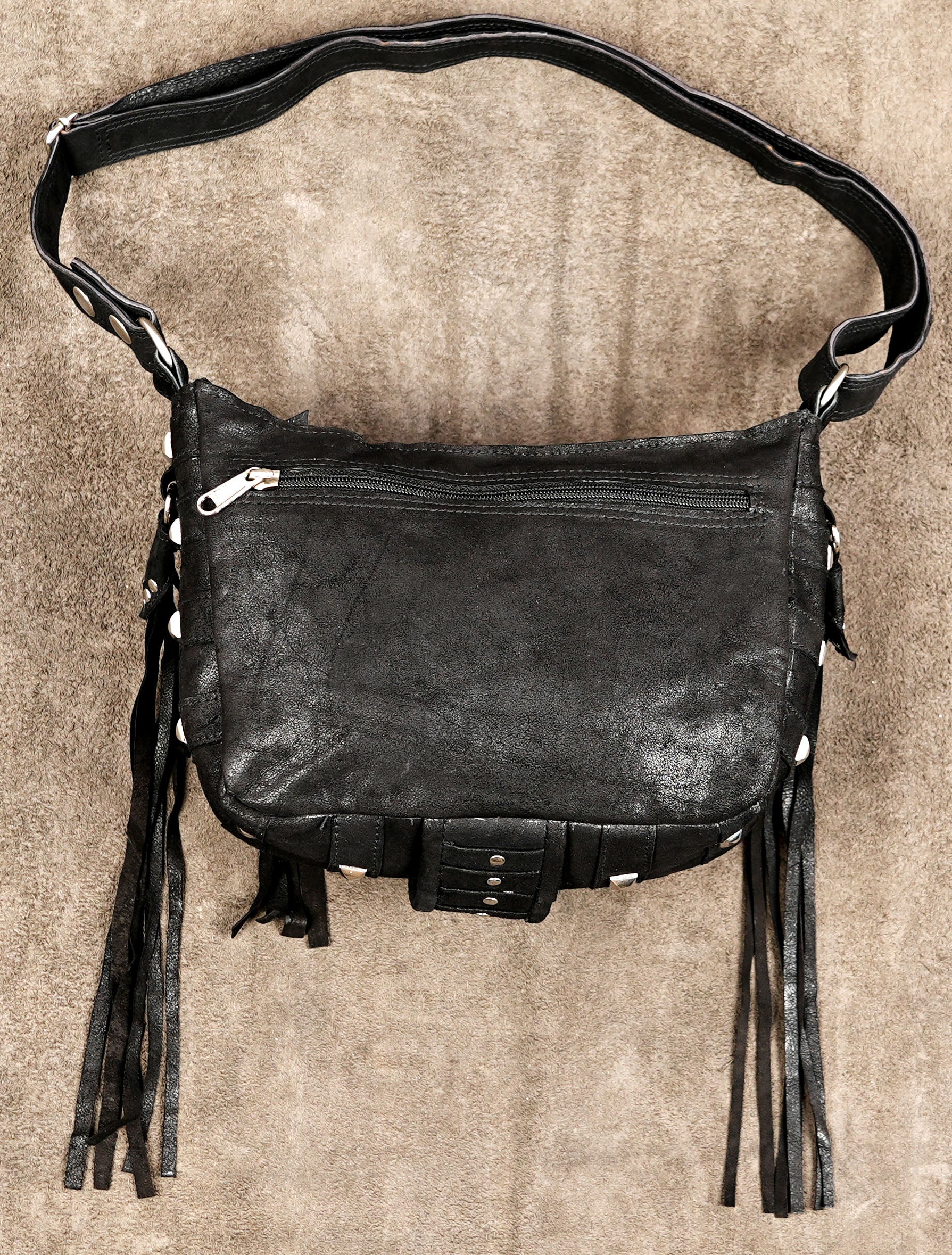 Boho cowgirl purse with long fringe and stud trim