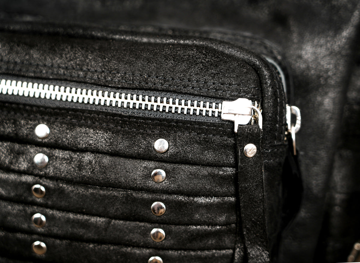 Boho crossbody bag with stud rows and adjustable strap