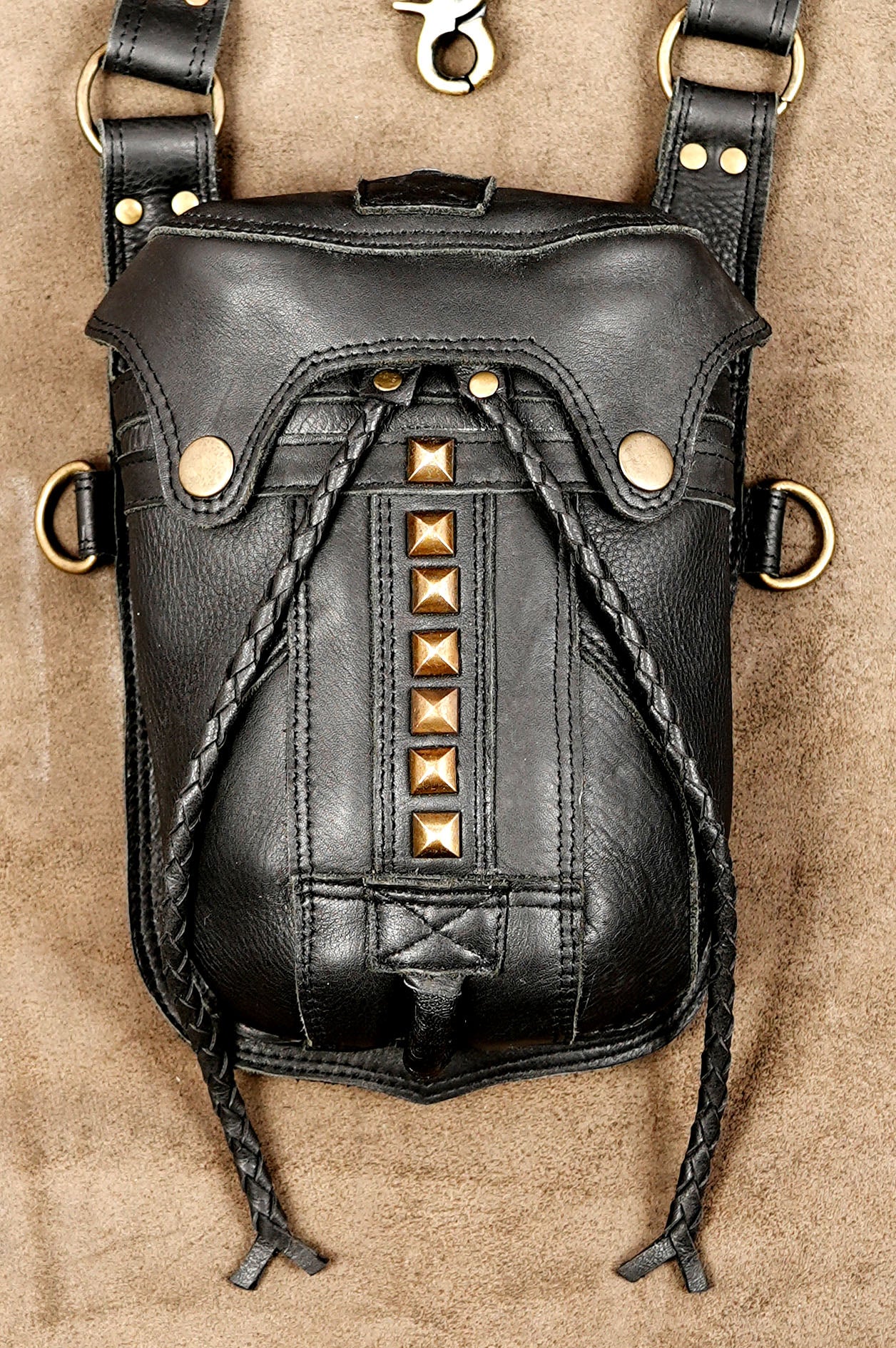 Chest holster bag with labradorite stone, flat lay front view