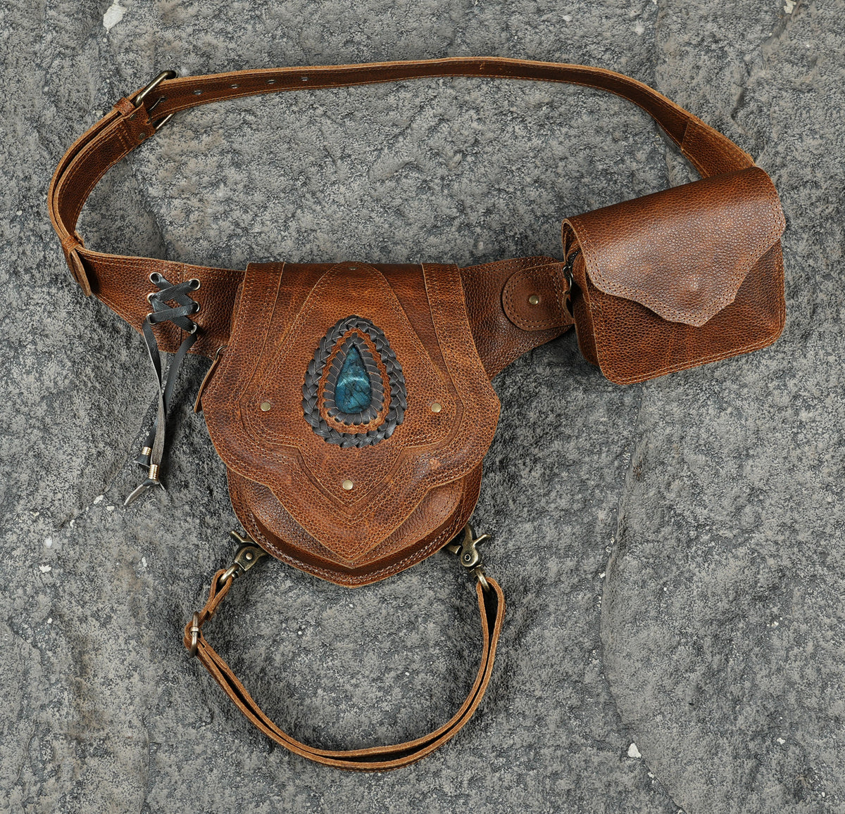 Convertible leather leg bag with brown tooled leather panels