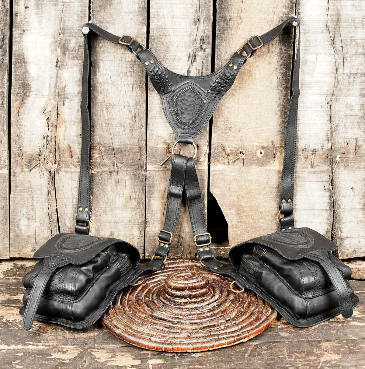 Steampunk shoulder harness with matching leather pouches and metal buckle closures