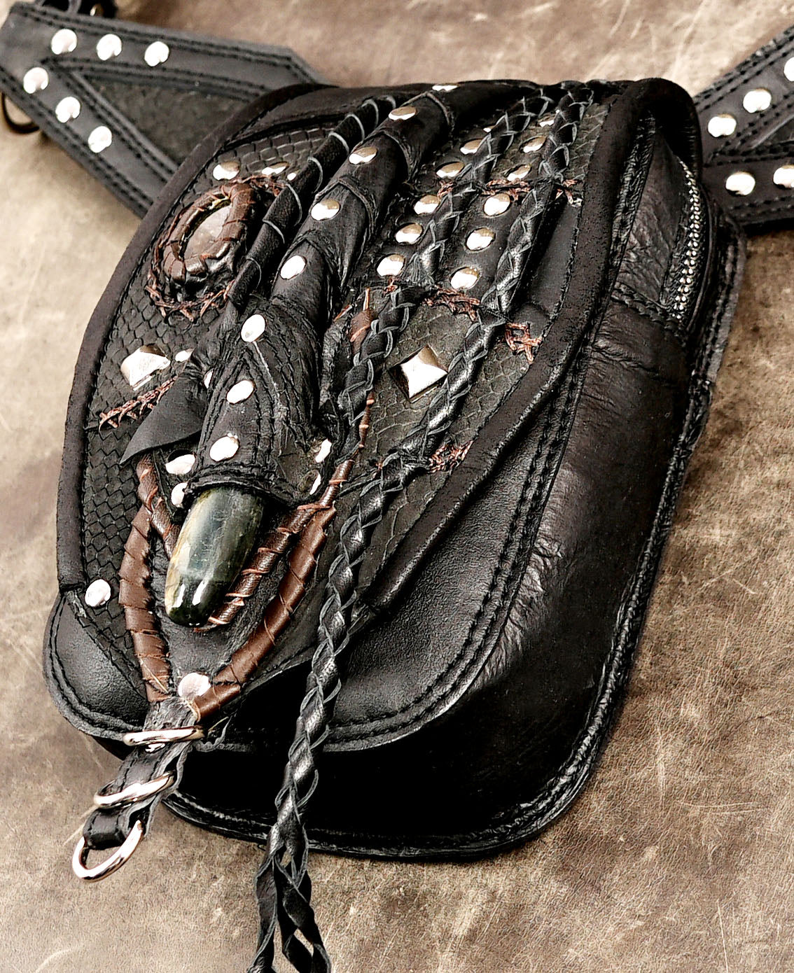 Crystal leather waist bag with braided leather details