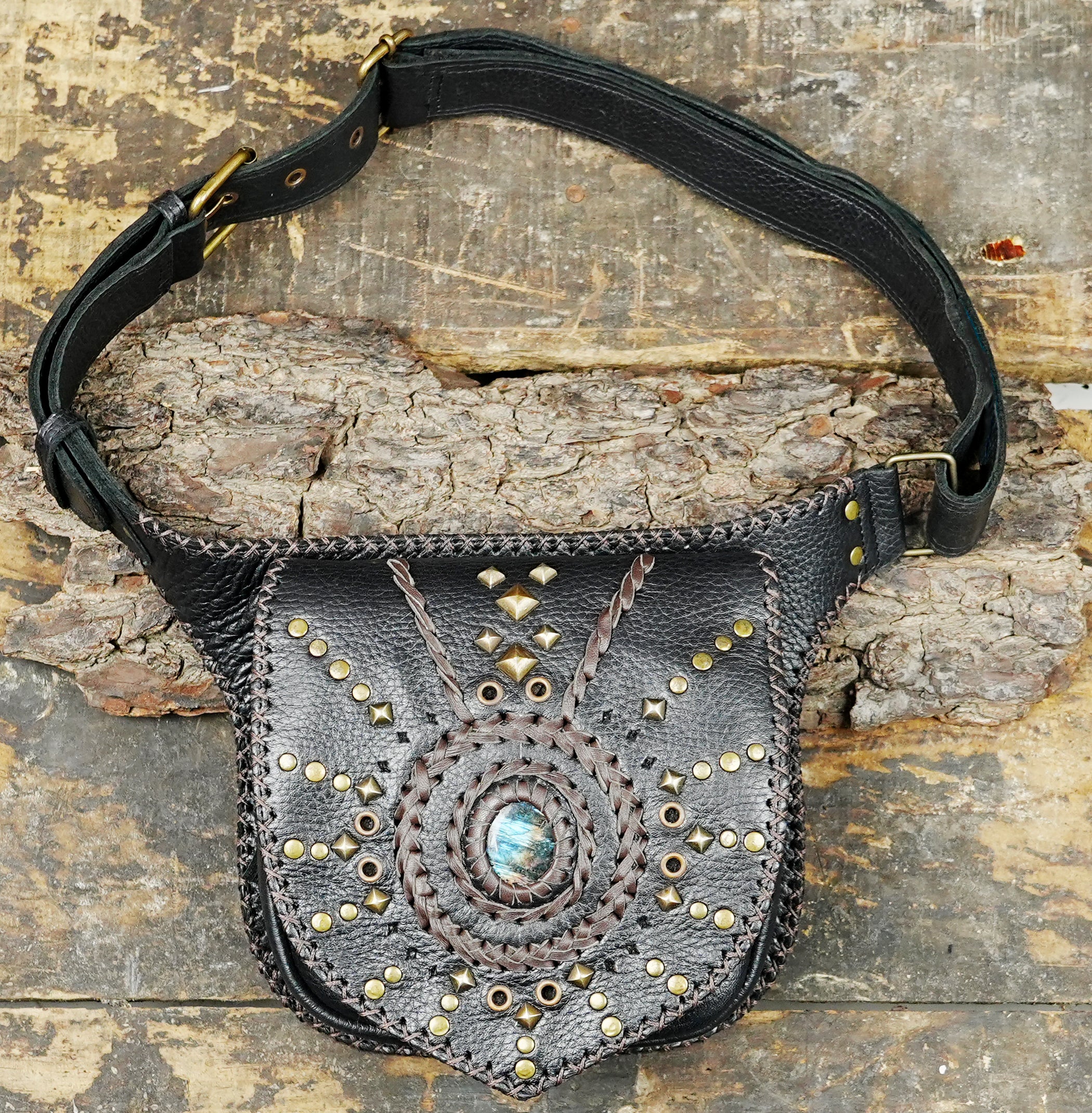 Handcrafted leather utility belt with stone centerpiece