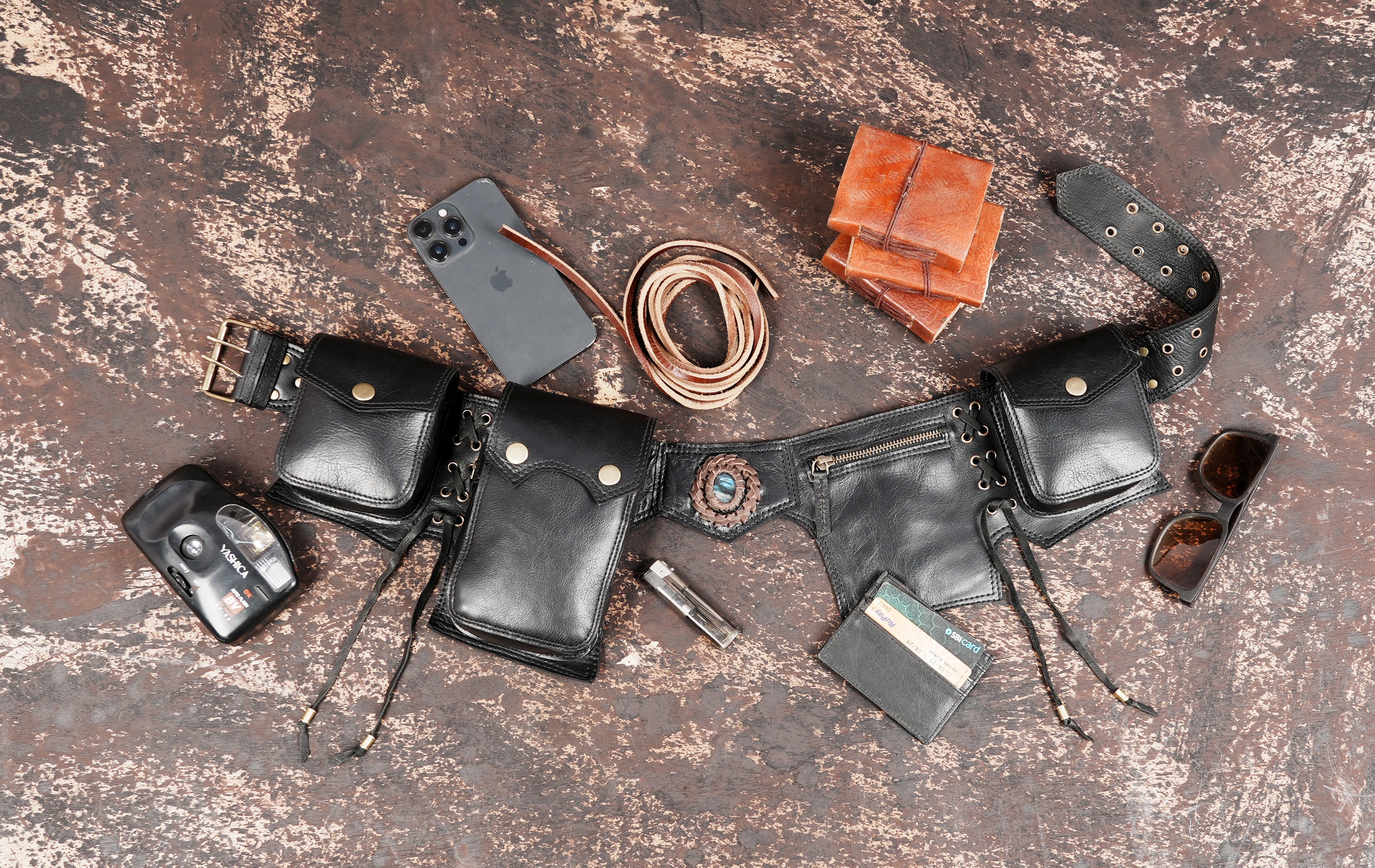 Unisex black leather pocket belt with decorative stone