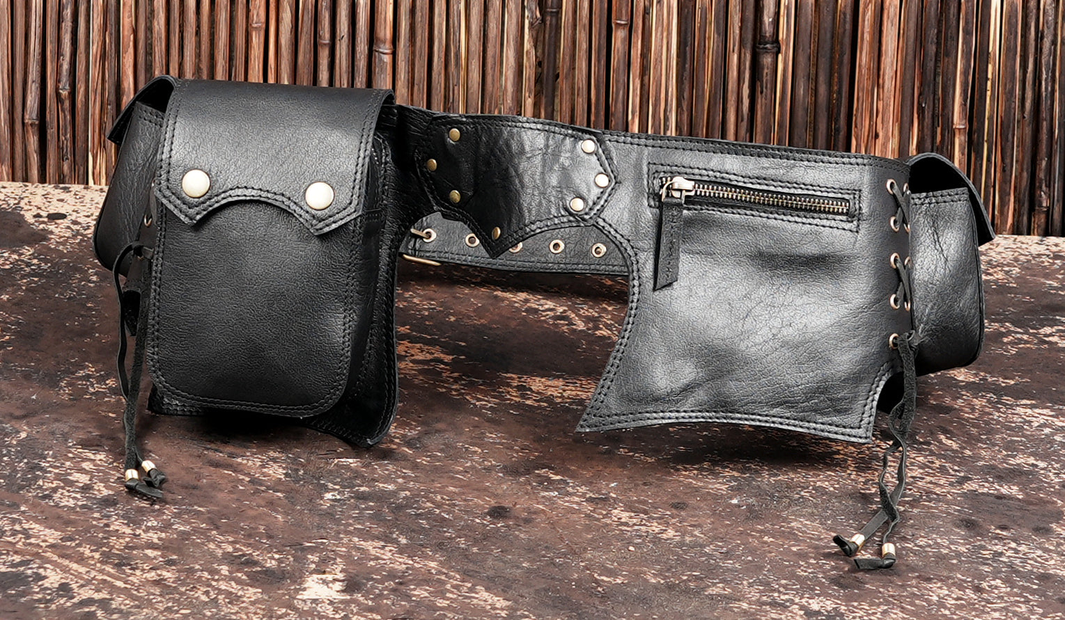Black handcrafted leather waist bag with storage pockets