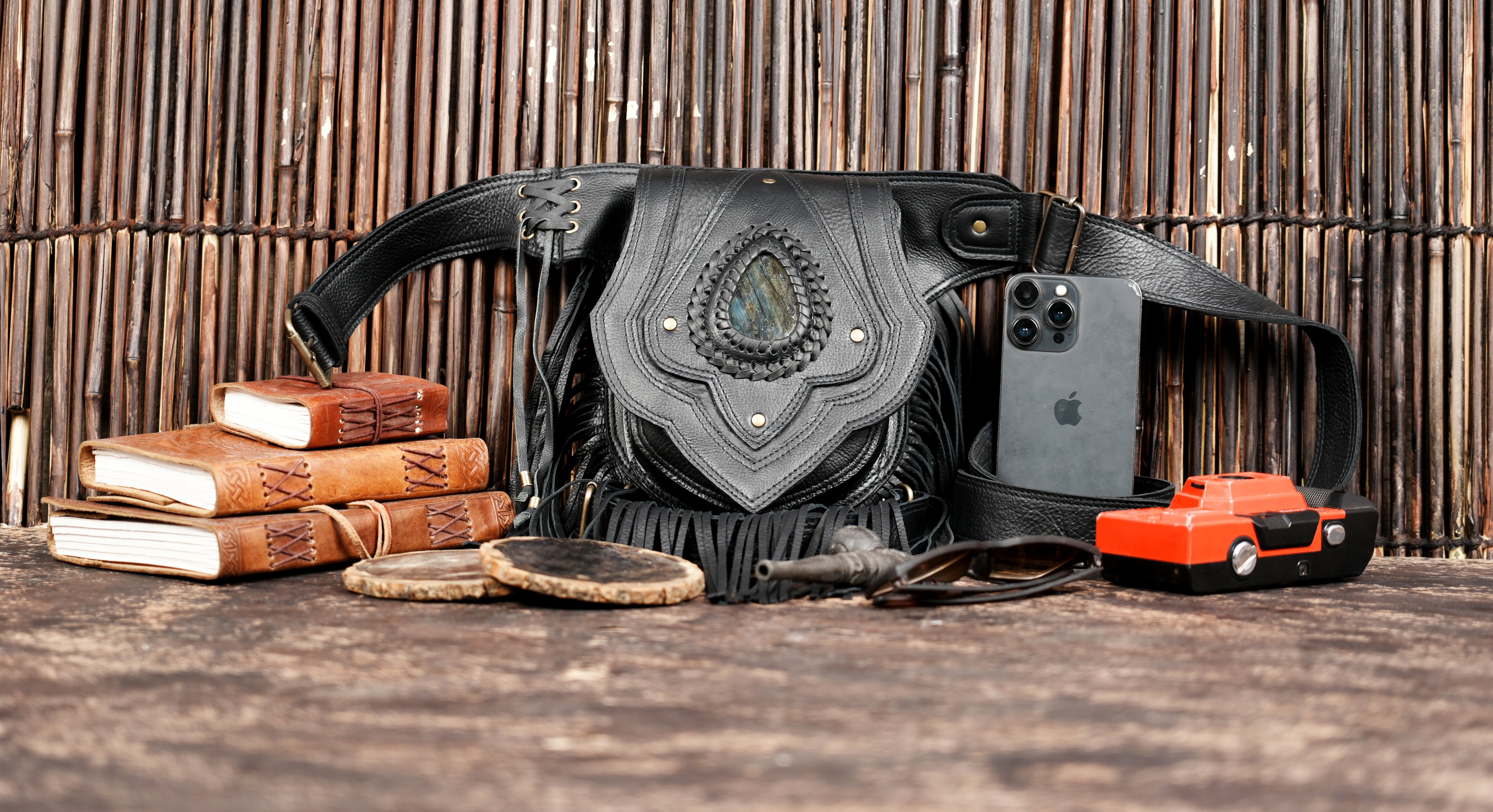 Designer boho hip belt with layered leather and gemstone centerpiece