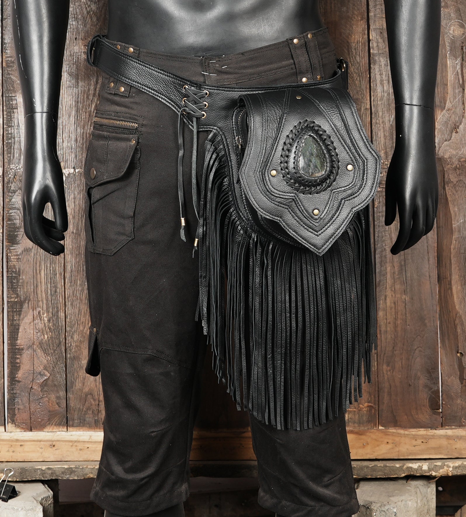 Unique handcrafted leather belt with fringe and gemstone ornament