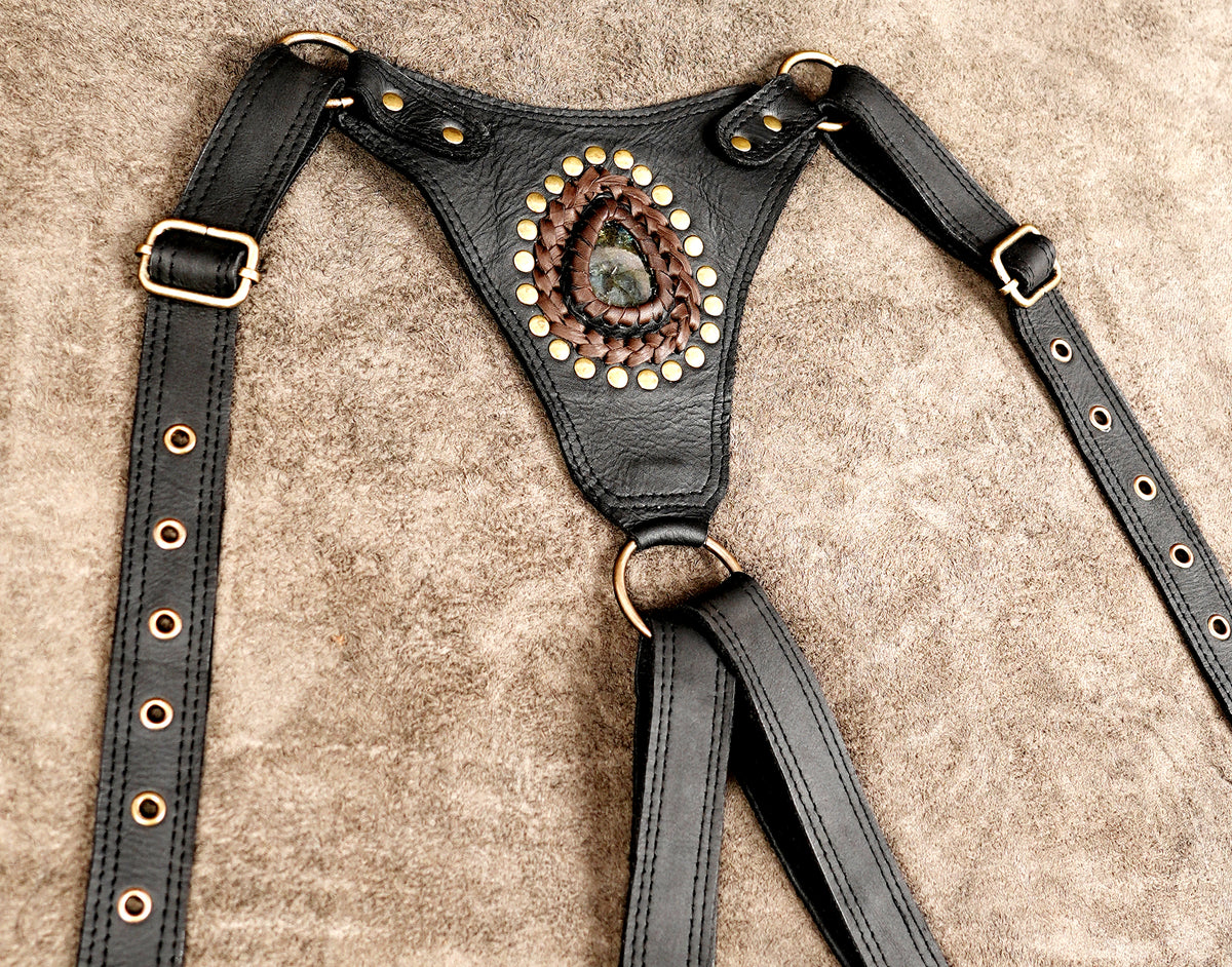 Black leather festival harness with adjustable buckled straps