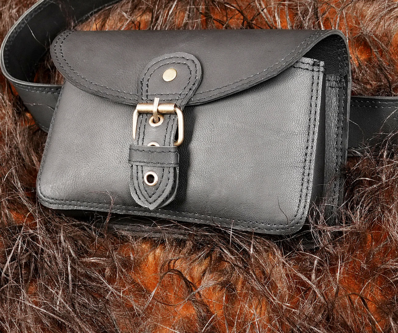 Black leather hip pouch for travel hiking and daily wear