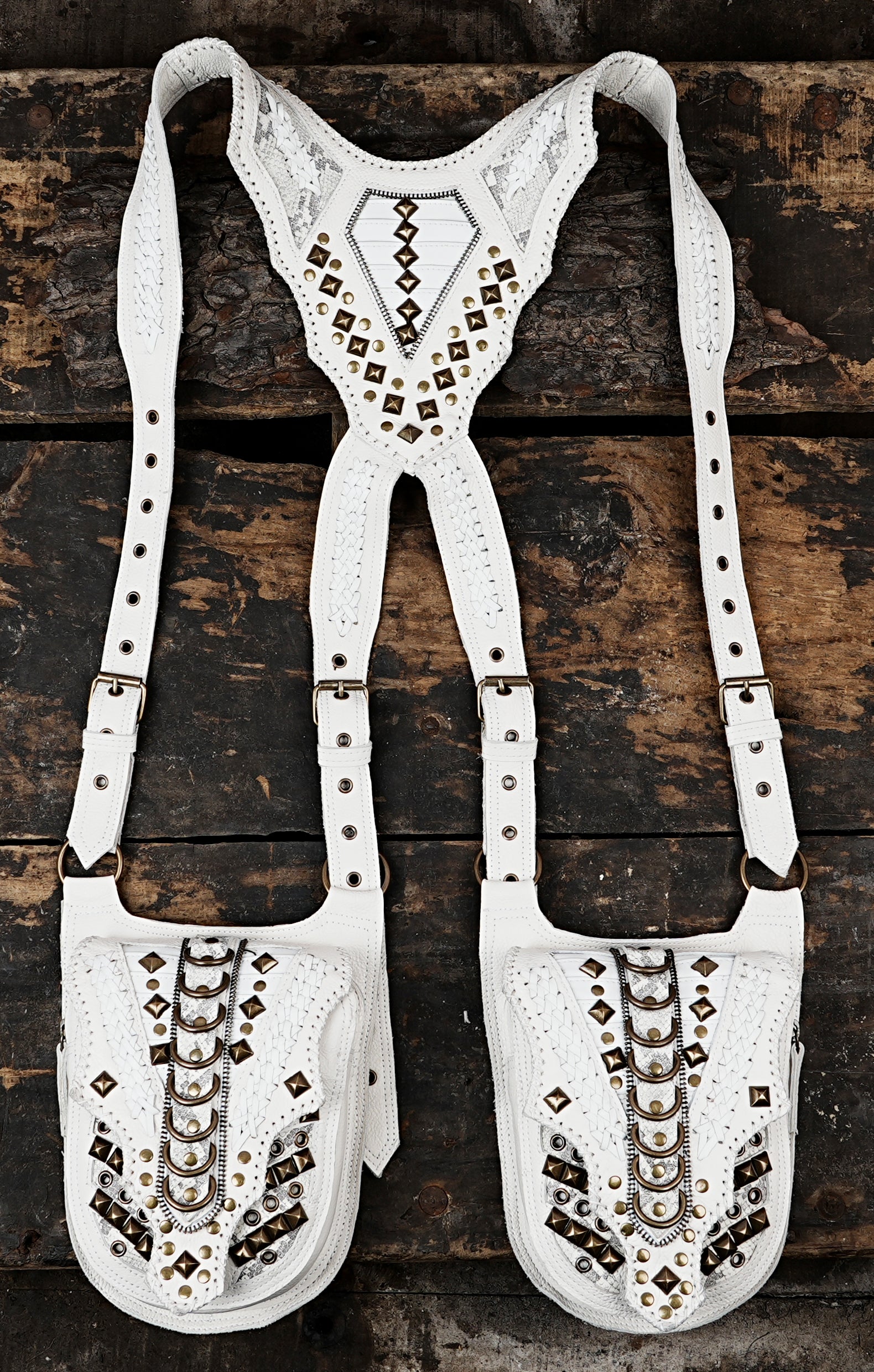 Tribal style leather shoulder holster with dual storage pouches