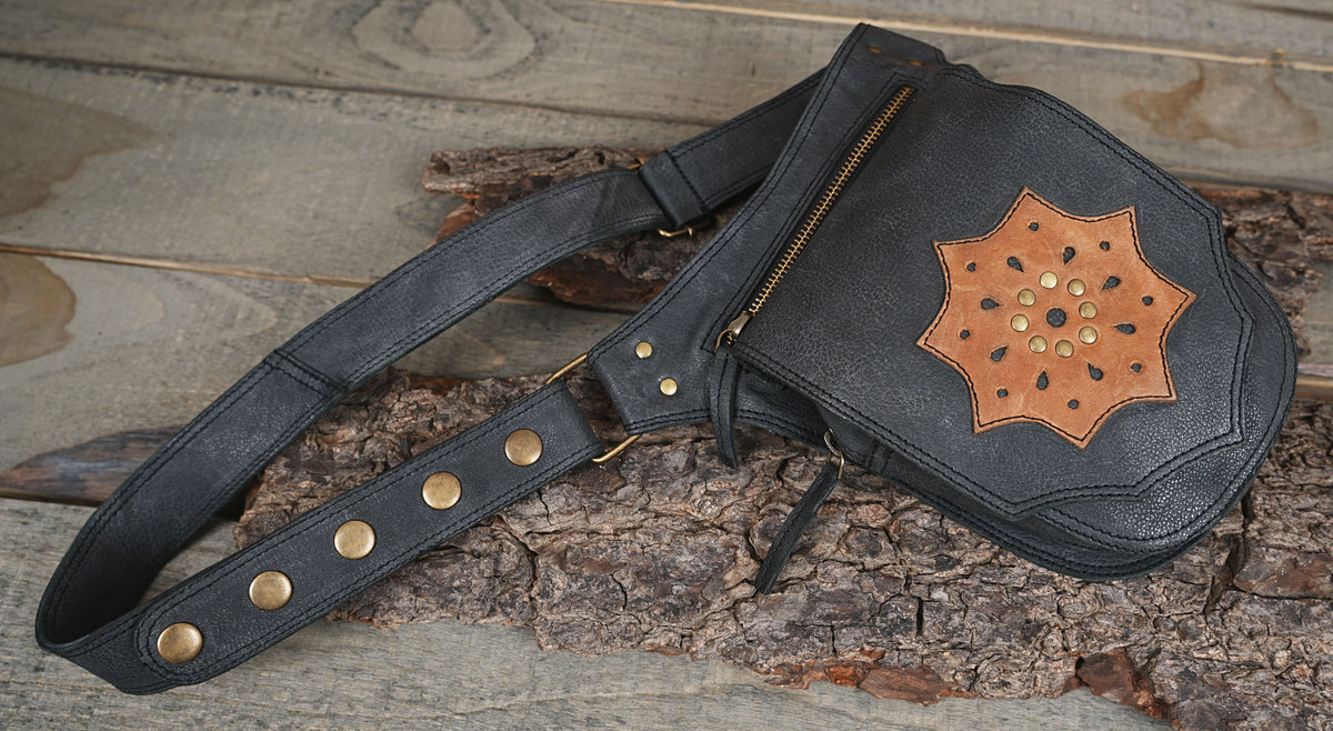 Utility leather leg bag with zippered pockets and adjustable strap
