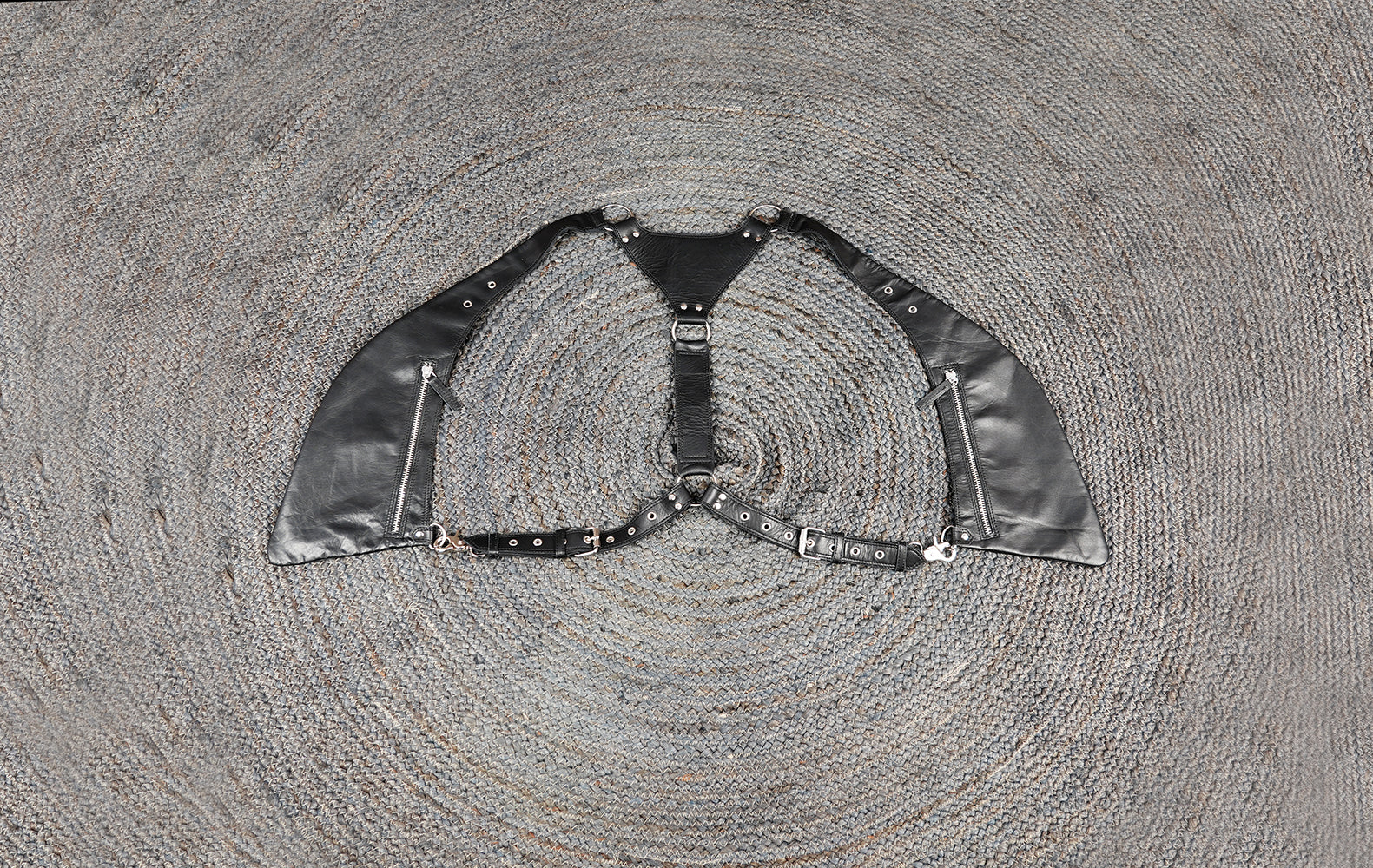 Leather chest holster with zipper pockets and reinforced stitching