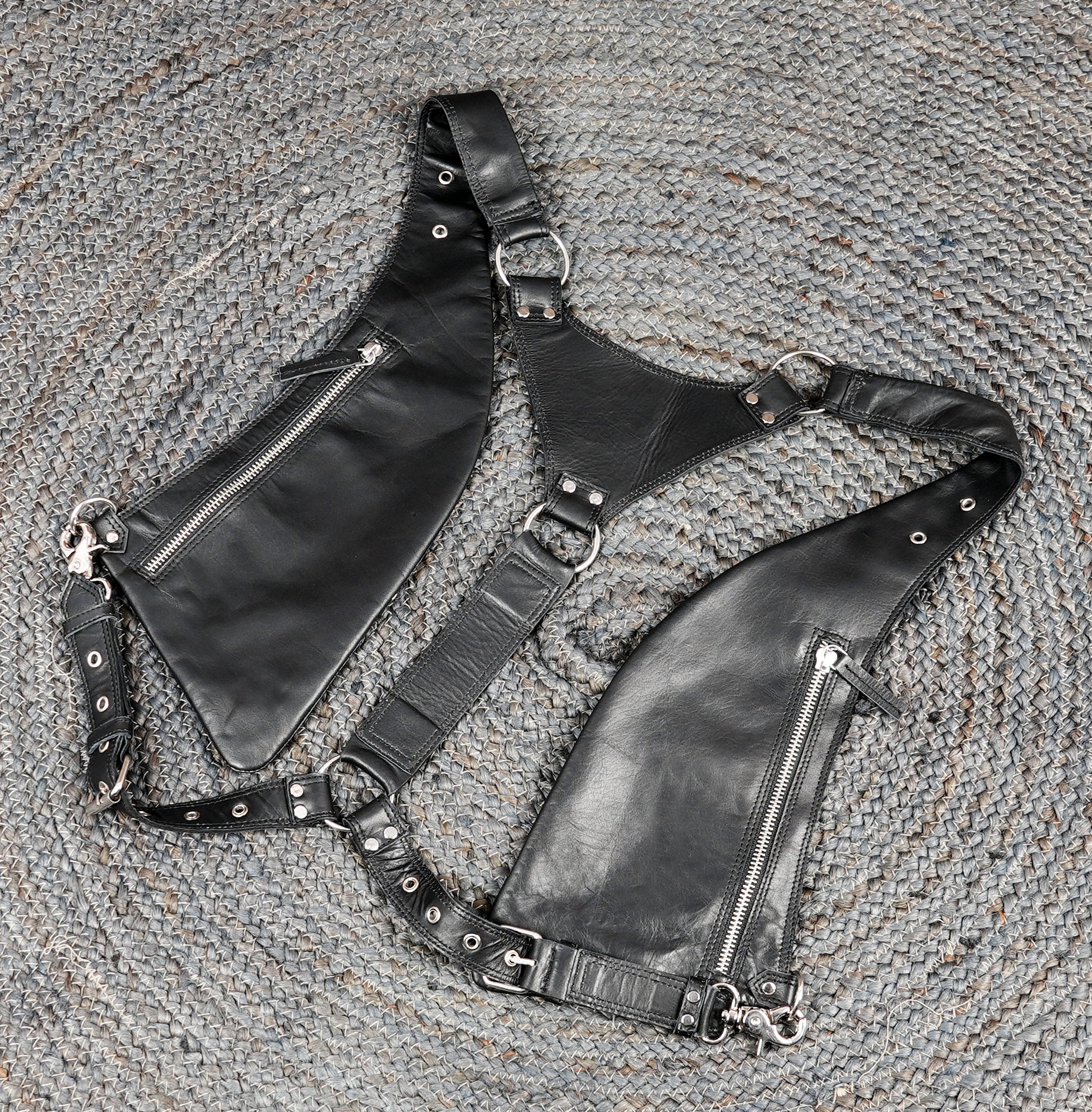 Minimalist leather shoulder holster with functional storage design