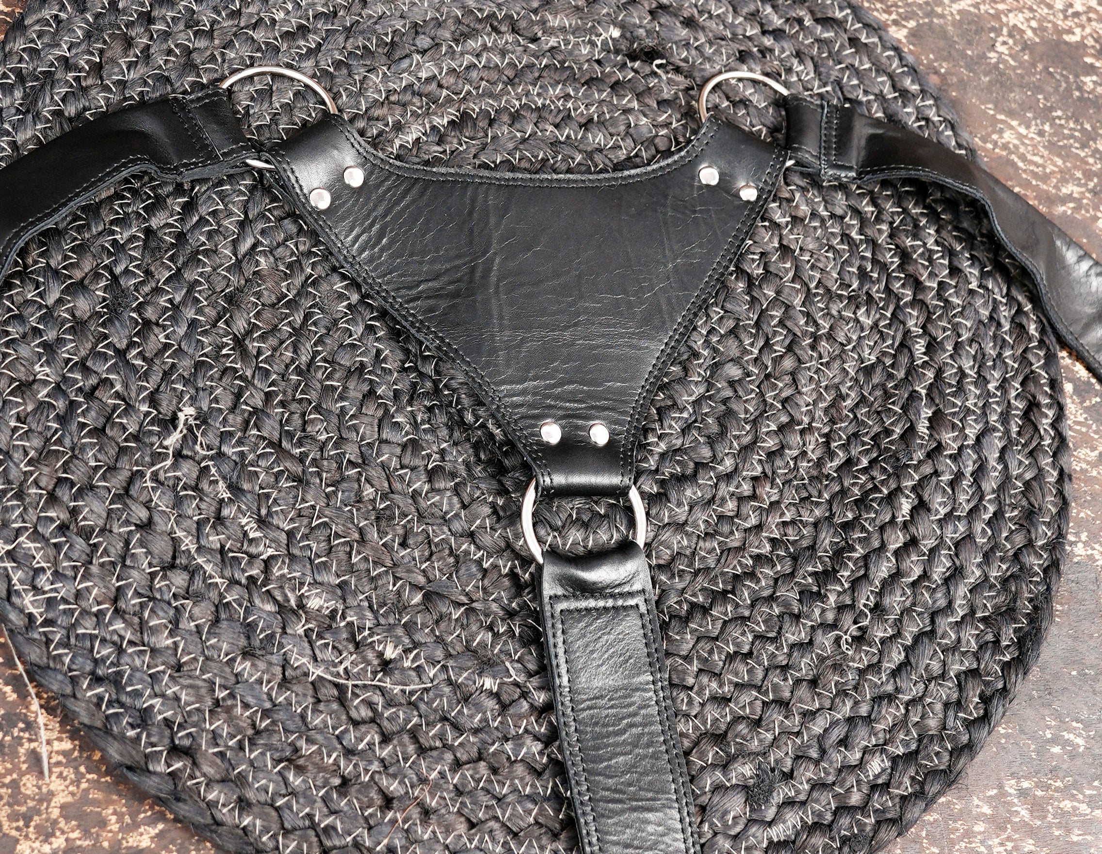 Black leather harness holster with durable hardware and zip pockets