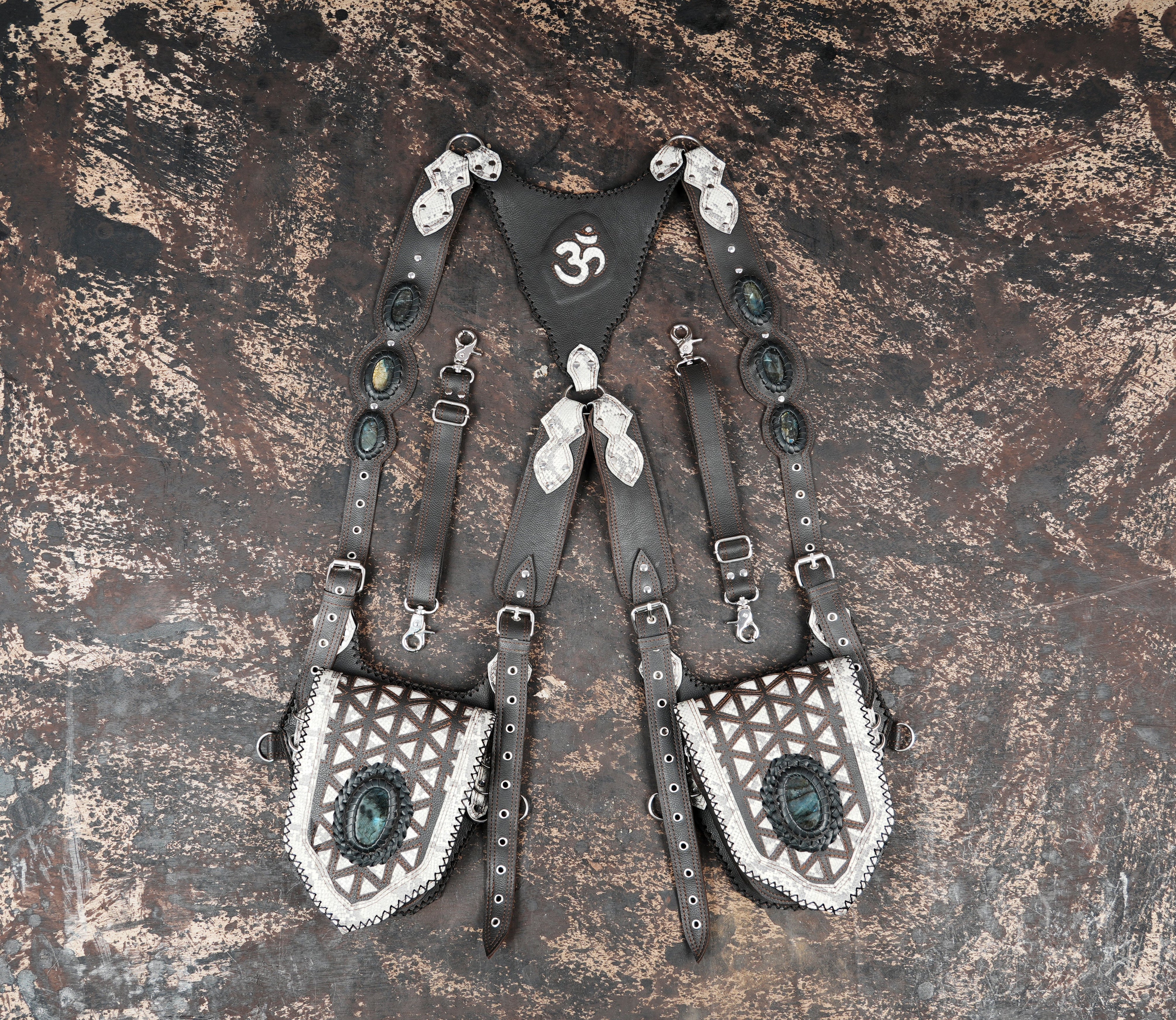 Handmade leather shoulder holster with Om symbol and gemstone detailing